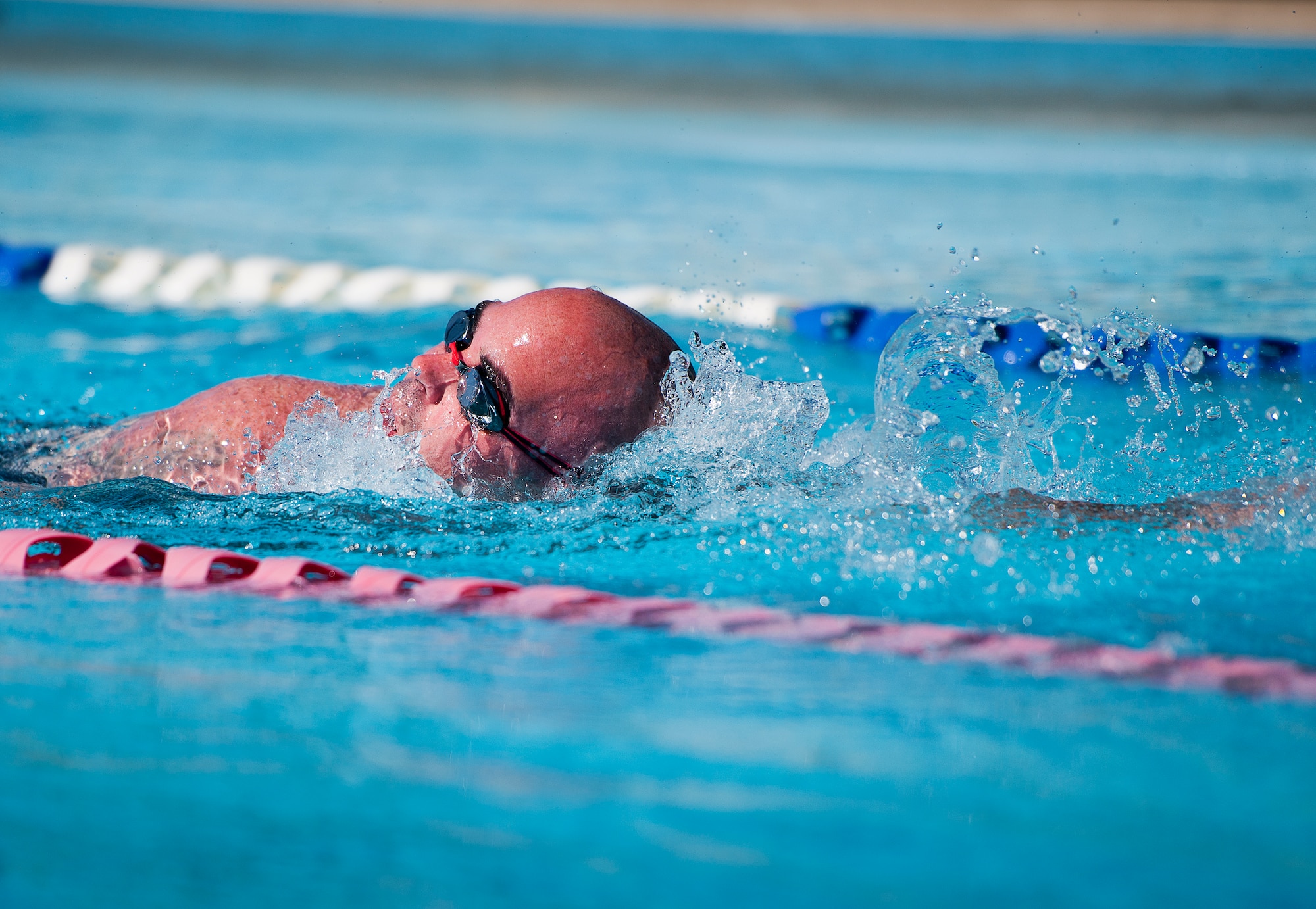 Jason Caswell, an Air Force Wounded Warrior athlete, swims laps during the fourth day of the Warrior Games training camp at Eglin Air Force Base, Fla., April 21. The five-day training camp for the Air Force’s athletes serves as their last practice session before the Warrior Games June 19-28. (U.S. Air Force photo/Samuel King Jr.)