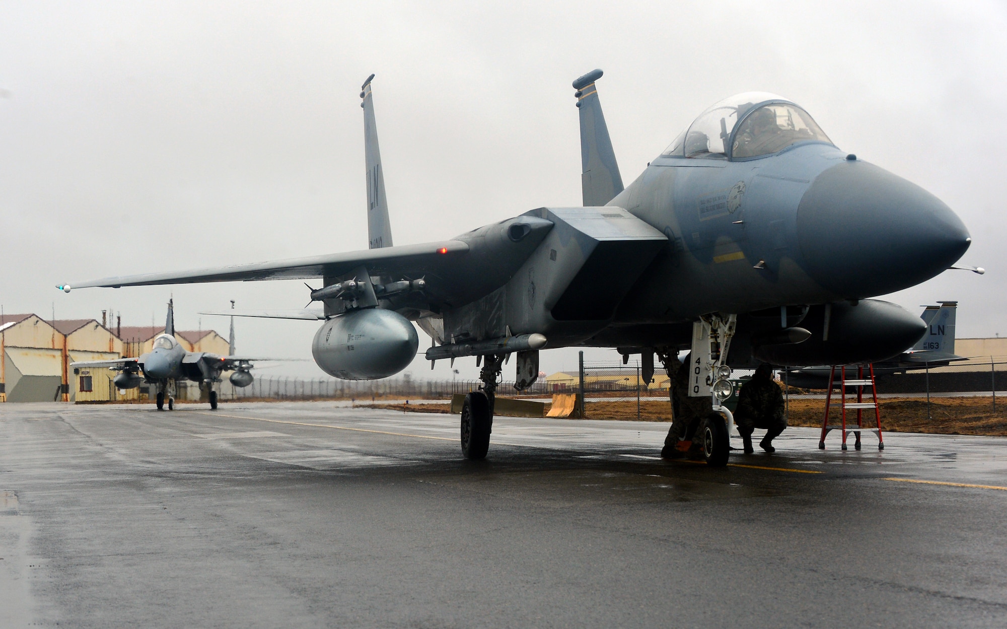 Two F-15C Eagle fighter aircraft with the 871st Air Expeditionary Squadron arrive at Keflavik International Airport, Iceland as part of Icelandic Air Surveillance and Policing operations April 13, 2015. IAS is an annual NATO mission designed to help provide security for Iceland's airspace. (U.S. Air Force photo by 2nd Lt Meredith Mulvihill/Released)
