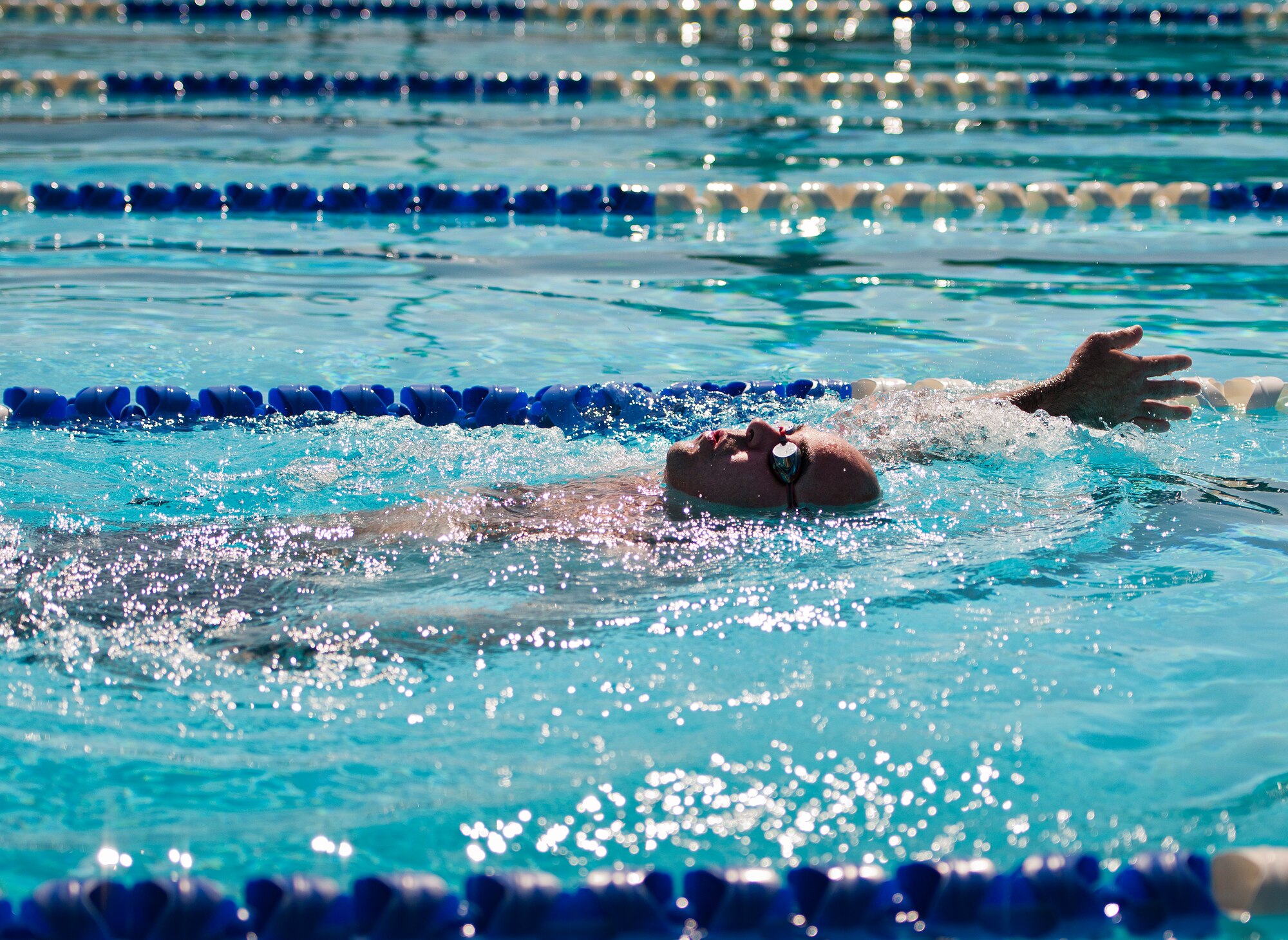 Jason Caswell, an Air Force Wounded Warrior athlete, swims laps during the final day of the Warrior Games training camp at Eglin Air Force Base, Fla., April 22. The five-day training camp for the Air Force’s athletes serves as their last practice session before the Warrior Games June 19-28. (U.S. Air Force photo/Samuel King Jr.)