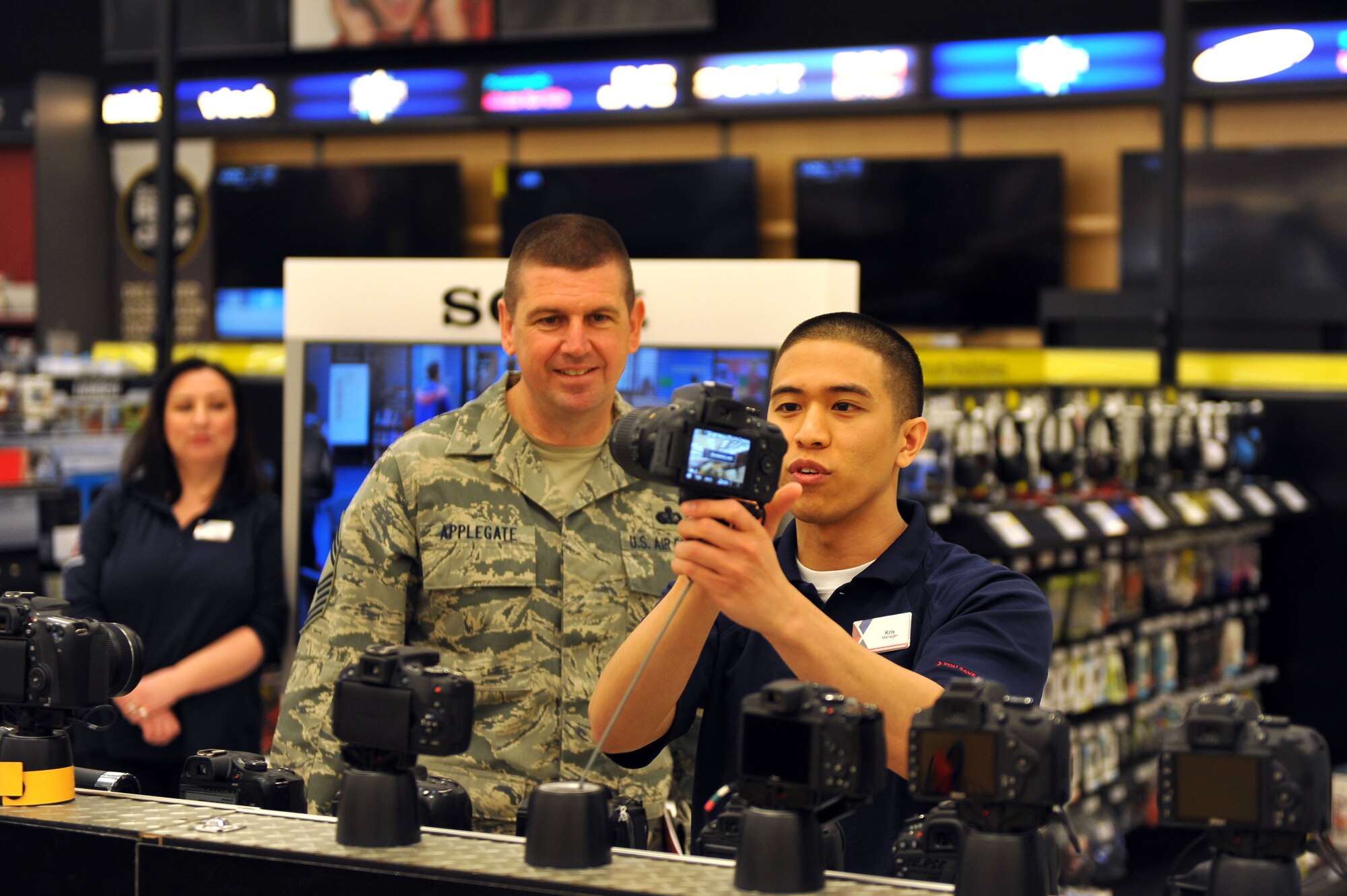 U.S. Air Force Chief Master Sgt. Sean E. Applegate, Senior Enlisted Advisor for the Army & Air Force Exchange Service, tours the electronics section of the BX, Offutt Air Force Base, Nebraska, Apr. 22. BX management gave the chief a tour of the facility and an opportunity to meet with staff members. (U.S. Air Force photo by Josh Plueger/Released)