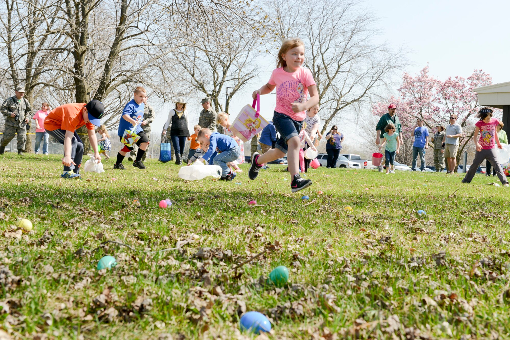 Members of the 132nd Wing (132WG), Des Moines, Iowa and their families participate in the 2015 Annual Easter Egg Hunt held outside of the Dining Facility of the 132WG on Saturday, April 11, 2015.  (U.S. Air National Guard photo by Staff Sgt. Linda K. Burger/Released)
