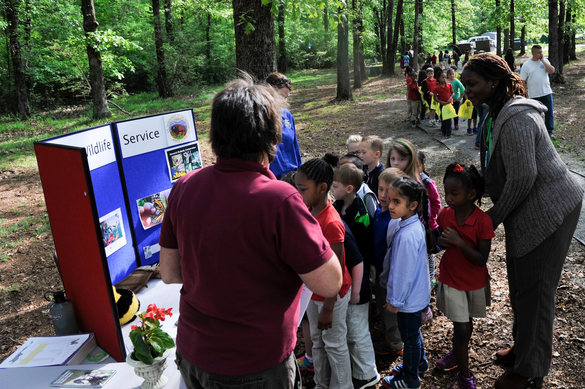 Arnold Drive Elementary School students observe Earth Day exhibit April 22, 2015, at Little Rock Air Force Base, Ark. Students learned about different environmental concerns as well as threatened and endangered animals. (U.S. Air Force photo by Senior Airman Regina Edwards)