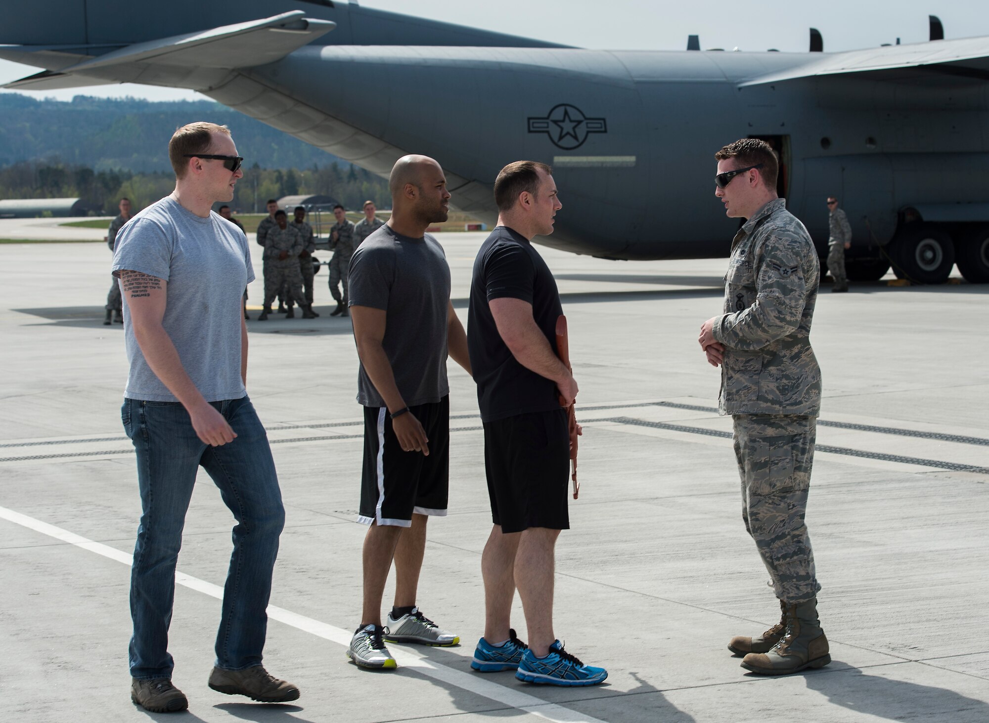 Airman 1st Class Cameron Triboulet, right, 569th U.S. Force Police Squadron security forces member, confronts “hostiles” during a Fly Away Security course Feb. 16, 2015, at Ramstein Air Base, Germany. The course is designed to help defenders gain the skills, knowledge and confidence they need in order to be successful in their position as a fly away security team members, protecting millions of dollars in assets. (U.S. Air Force photo/Senior Airman Damon Kasberg)
