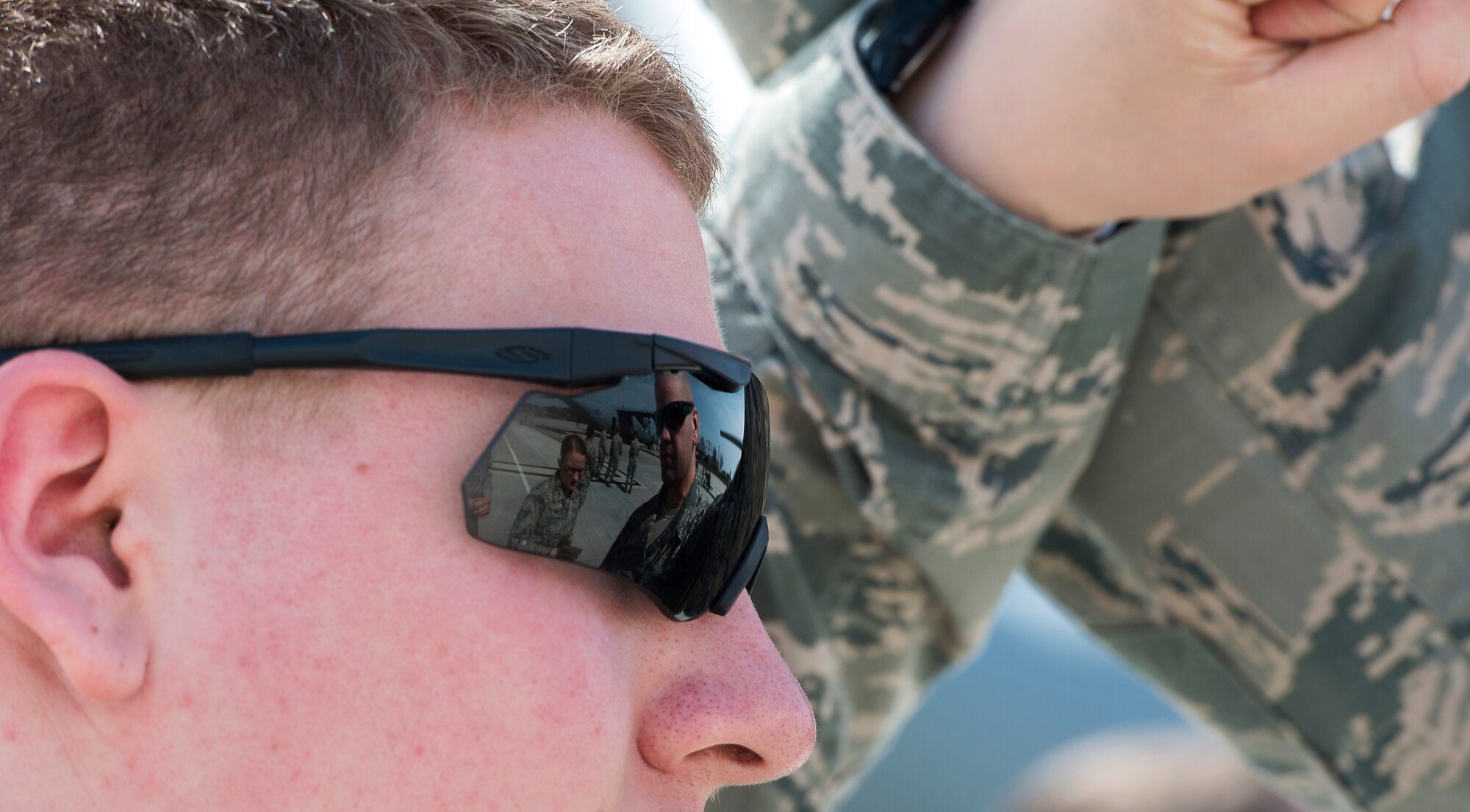 Senior Airman Thomas Groves, 569th U.S. Forces Police Squadron alarm monitor, practices weapon takeaway techniques during a Fly Away Security course Feb. 16, 2015, at Ramstein Air Base, Germany. The course is designed to help defenders gain the skills, knowledge and confidence they need in order to be successful in their position as a fly away security team members, protecting millions of dollars in assets. (U.S. Air Force photo/Senior Airman Damon Kasberg)