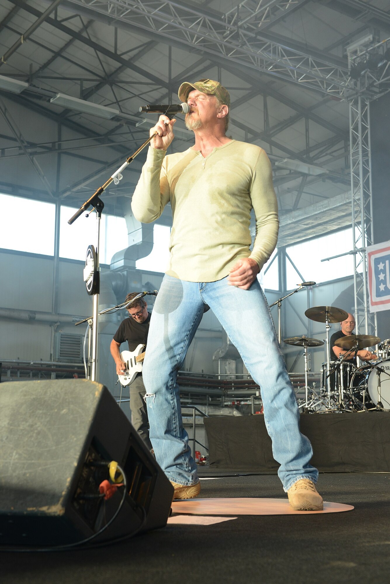 Trace Adkins, country music singer, performs during a concert for a ten-day USO tour April 20, 2015, at Ramstein Air Base, Germany. Adkins has performed for over 40,000 troops and their families during 10 USO tours in seven countries. (U.S. Air Force photo/Airman 1st Class Tryphena Mayhugh)