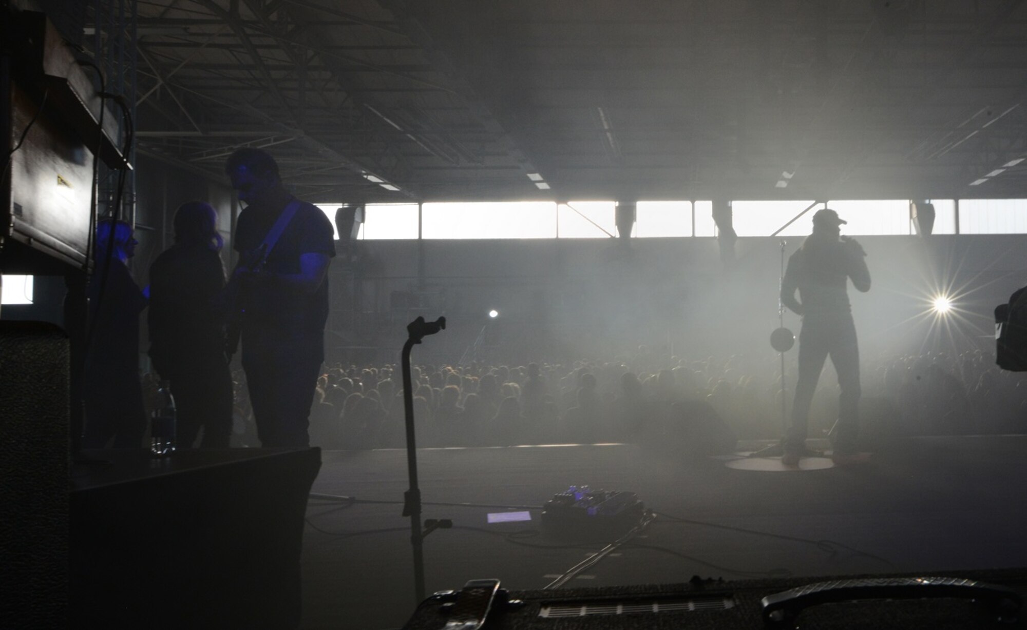 Trace Adkins, country music singer, performs for attendees during a concert for a ten-day USO tour April 20, 2015, at Ramstein Air Base, Germany. Adkins performed on a replica of the six-foot wooden circle that sits center stage at the Grand Ole Opry House in honor of its 90th anniversary. (U.S. Air Force photo/Airman 1st Class Tryphena Mayhugh)
