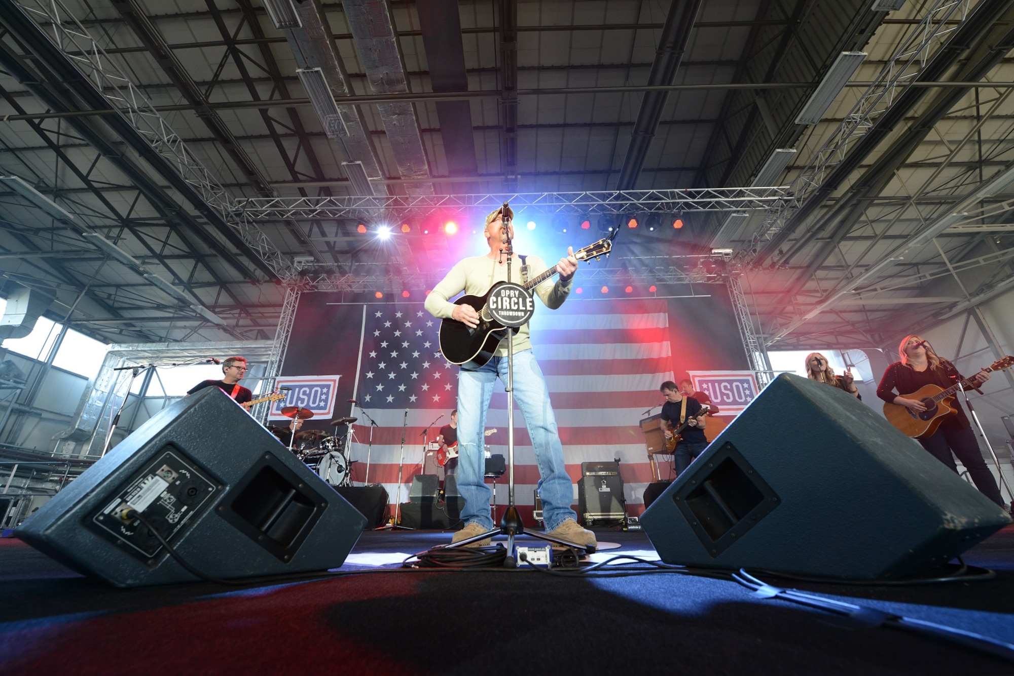 Trace Adkins, country music singer, performs for members of the Kaiserslautern Military Community during a USO concert April 20, 2015, at Ramstein Air Base, Germany. Adkins has participated in 10 USO tours and has performed for troops in seven countries. (U.S. Air Force photo/Airman 1st Class Tryphena Mayhugh)