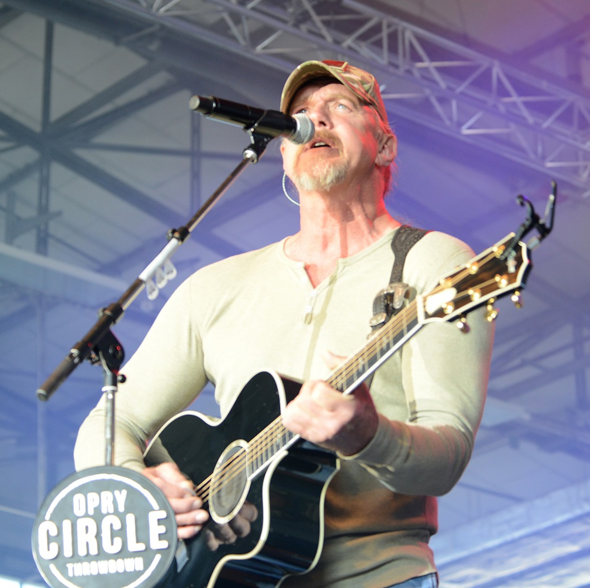 Trace Adkins, country music singer, performs during a USO concert April 20, 2015, at Ramstein Air Base, Germany. The concert was free for all Department of Defense ID cardholders and was in honor of the Grand Ole Opry’s 90th anniversary. (U.S. Air Force photo/Airman 1st Class Tryphena Mayhugh)
