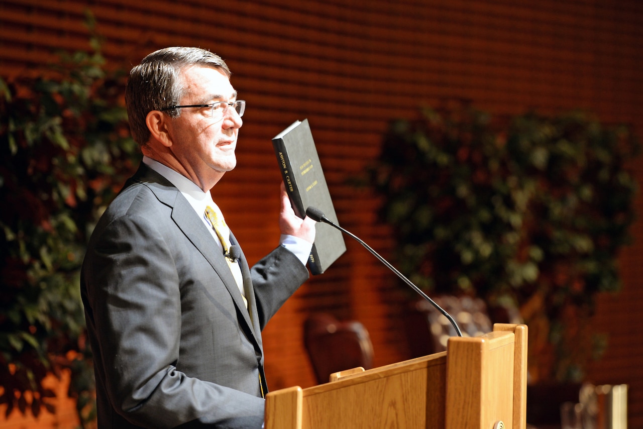 Defense Secretary Ash Carter delivers a lecture, "Rewiring the Pentagon: Charting a New Path on Innovation and Cybersecurity," at Stanford University in Stanford, Calif., April 23, 2015. The lecture highlighted the Pentagon's new cyber strategy and innovation initiatives. In his introductory remarks, Carter held up a copy of his doctoral thesis. DoD photo by U.S. Army Sgt. 1st Class Clydell Kinchen
