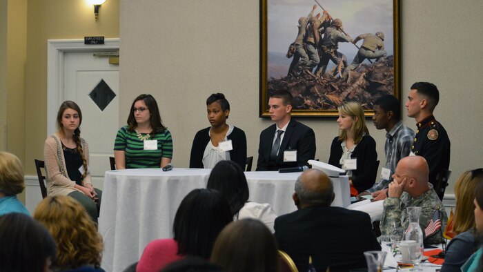 A group of students attended that the sixth annual Education Symposium to answer a question asked of the them by educators at Marine Corps Base Quantico, Virginia April 16. The symposium was hosted by Quantico’s school liaison officers and held at The Clubs at Quantico. The students came from both Quantico Middle/High School and off-base schools in the local area. From the left are student Aliyah, Dutch, Emily and Donovan.