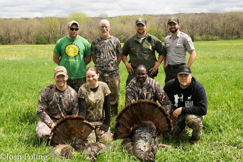 Perry Lake Staff and Wounded Warriors pose with the turkey harvested during the Perry Lake Wounded Warrior Turkey Hunt on April 18 and 19. Photo by Capt. Joshua Poling.