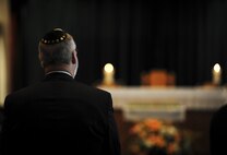A man attends the Holocaust memorial service at the base chapel on Hurlburt Field Fla., April 22, 2015. The memorial was held as a remembrance to honor those who lost their lives during the Holocaust. (U.S. Air Force photo by Senior Airman Meagan Schutter)