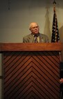 Retired Army Col. Martin Siegel speaks at the Holocaust memorial service at the base chapel on Hurlburt Field Fla., April 22, 2015. The memorial was held as a remembrance to honor those who lost their lives during the Holocaust. (U.S. Air Force photo by Senior Airman Meagan Schutter)