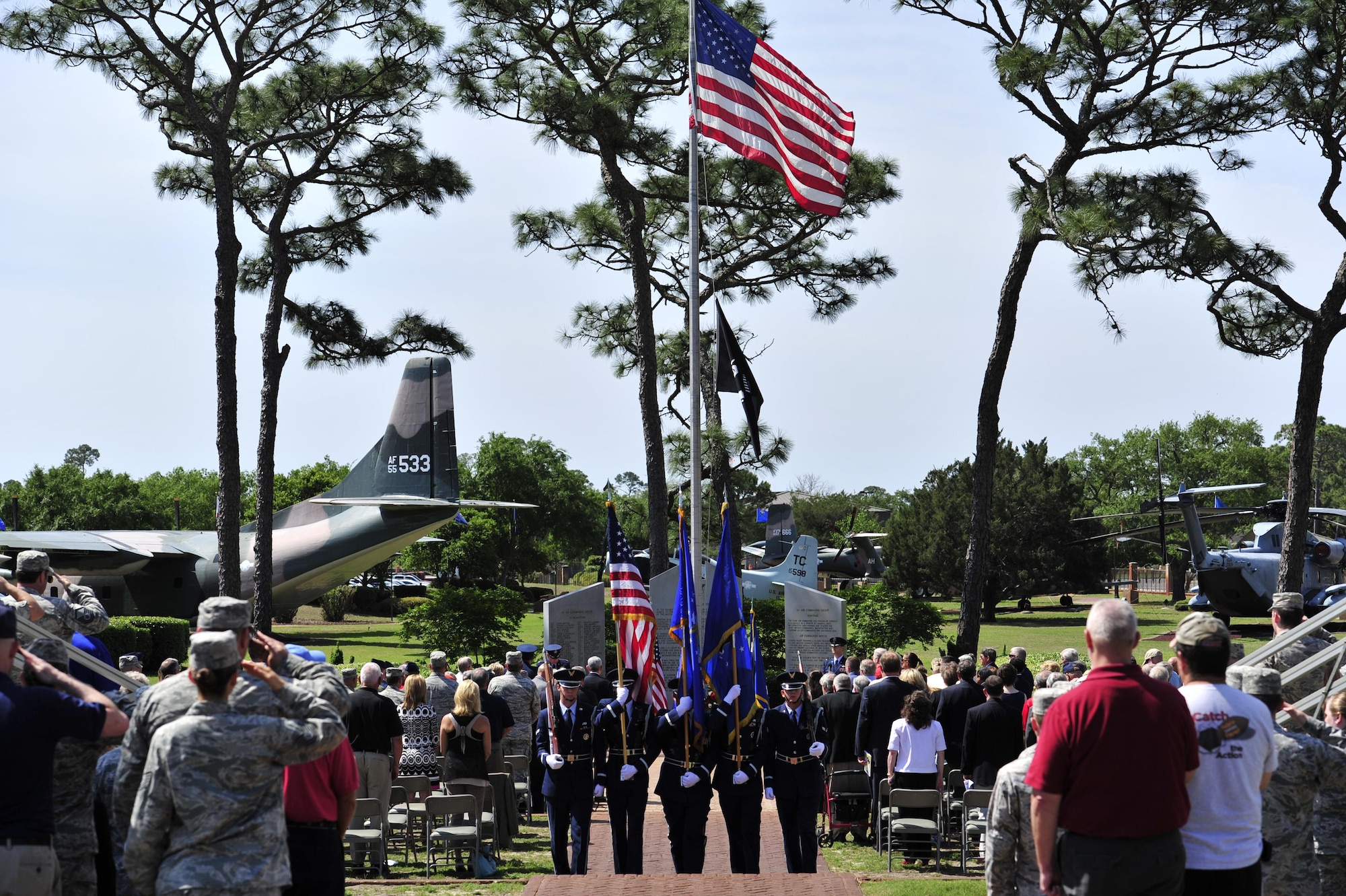 The honor guard departs the Operation Eagle Claw memorial ceremony after presenting the colors at the air park on Hurlburt Field, Fla., April 24, 2015. Operation Eagle Claw, conducted April 24, 1980, was a joint services mission to rescue Americans who were being held hostage by a mob in Tehran, Iran, since Nov. 4, 1979. Tragically, the attempt ended in the death of eight service members. (U.S. Air Force photo/Staff Sgt. Melanie Holochwost)