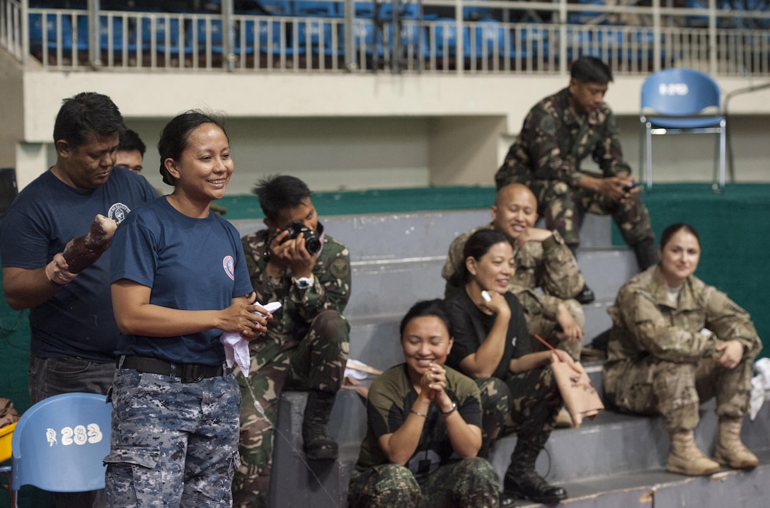 Philippine Coast Guard Lt. j.g. Melisa M. Acosta, Political Service nurse officer and assistant team leader, provides feedback for local health workers during exercise Balikatan’s first responder training course in Puerto Princesa, Palawan, Philippines, April 22. U.S. military and Armed Forces of the Philippines training instructors worked shoulder-to-shoulder to train 179 health workers and members of other local agencies to learn skills and techniques to better respond to a mass casualty. This year marks the 31st iteration of the exercise, which is an annual Philippine-U.S. bilateral military training exercise and humanitarian civic assistance engagement.