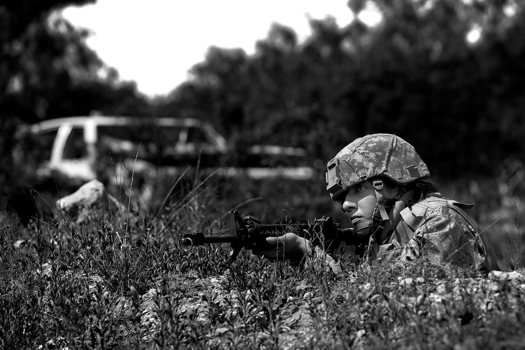 Corrie J. Shafer, Angelo State University Air Force ROTC Detachment 847 cadet, aims down her sights during a field training exercise at a deployed simulation village near Camp Sentinel, April 18, 2015. The FTX is designed to give cadets a broader understanding of what the Air Force is truly like before committing to serve. (U.S. Air Force photo by Airman 1st Class Devin Boyer)