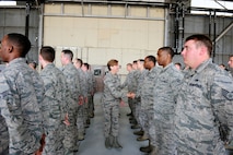 Gen. Lori J. Robinson, Pacific Air Forces commander, shakes hands with 8th Aircraft Maintenance Squadron Airmen during her visit to Kunsan Air Base, Republic of Korea, April 23, 2015. Robinson had the opportunity to see firsthand how Kunsan Airmen contribute to deterring aggression on the Korean Peninsula during her first visit to Kunsan. (U.S. Air Force photo by Senior Airman Taylor Curry/Released) 