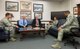 Service members meet with members of the National Weather Service at Mountain Home Air Force Base, Idaho, April 23, 2015. MHAFB is now one of 2,600 communities nationwide to be StormReady-certified. (U.S. Air Force photo by Airman 1st Class Jeremy L. Mosier/Released)