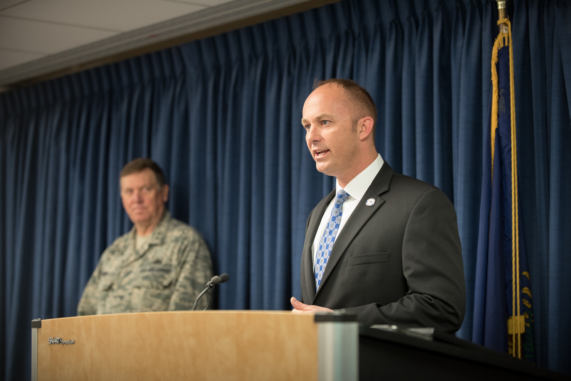 Matt Selph, director of the Kentucky Board of Elections, speaks to more than 40 members of the 123rd Airlift Wing at the Kentucky Air National Guard Base in Louisville, Ky., April 24, 2015, prior to the Airmen's deployment to an undisclosed air base in the Persian Gulf region. The troops, who left aboard a Kentucky Air Guard C-130 Hercules aircraft, comprise the third rotation of 123rd Airmen to deploy to the base since February. The Air Guardsmen will be flying airlift missions throughout the U.S. Central Command Area of Responsibility in support of Operation Freedom's Sentinel, which provides military training and counterterrorism capabilities in Afghanistan. (U.S. Air National Guard photo by Maj. Dale Greer)