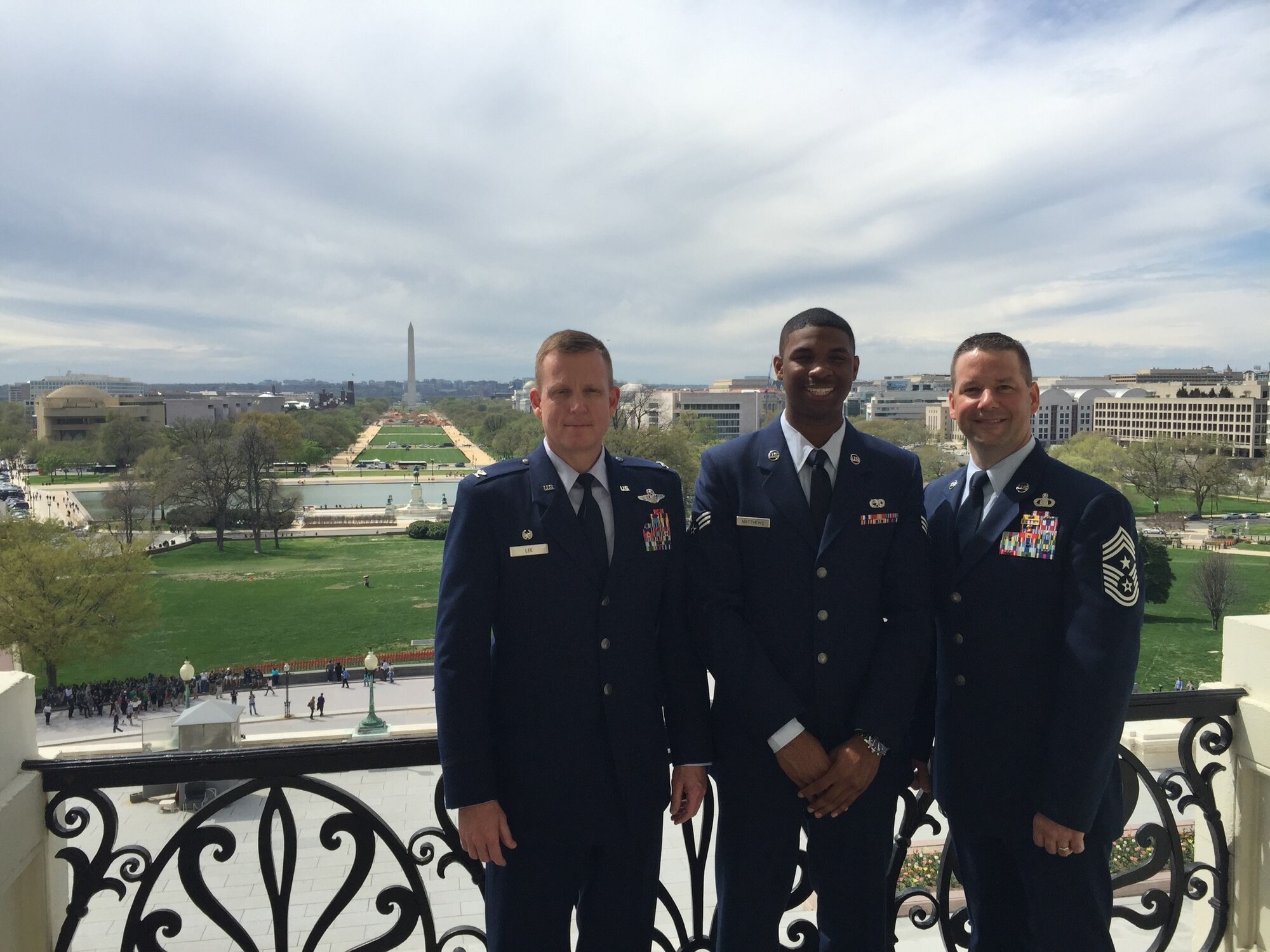 Col. Douglas Lee, 9th Reconnaissance Wing commander, Chief Master Sgt. Randy Kwiatkowski, 9th RW command chief, and Senior Airman Matthews, 9th Aircraft Maintenance Squadron U-2 assistant dedicated crew chief, pose for a picture outside of Capitol Hill overlooking the National Mall April 16, 2015. (Courtesy photo)