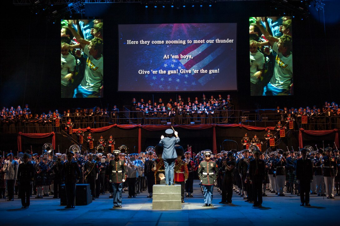 A United States Air Force Master Sergeant conducts the 2015 Virginia International Tattoo during a presentation of the Air Force song, February 23. The Tattoo is an annual performance exhibiting military bands, massed pipes and drums, drill teams, Celtic dancers, cultural performers, choirs and more. This year’s theme is “A Tribute to Military Families.” (U.S. Air Force photo by Staff Sgt. Steve Stanley/Released)