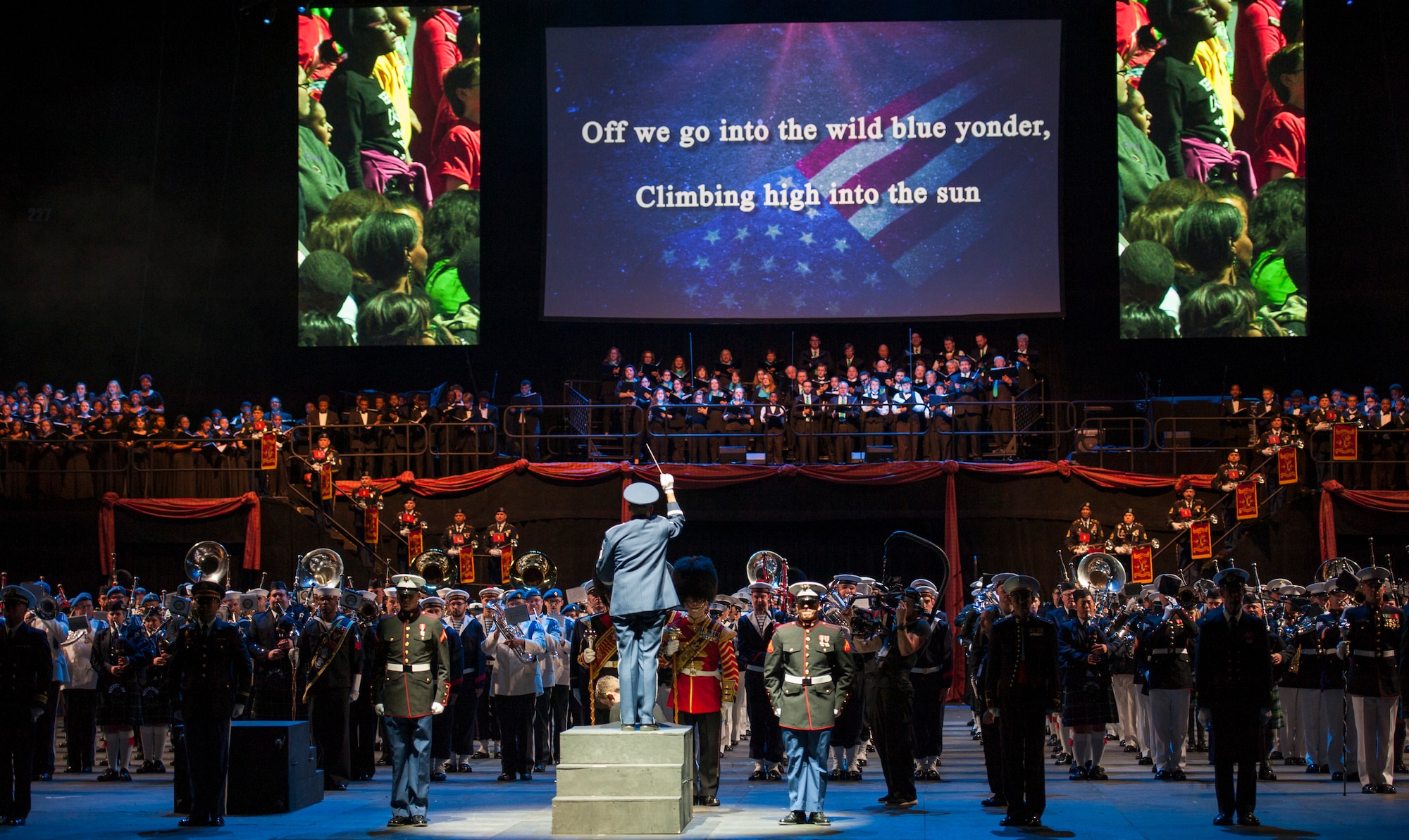 A United States Air Force Master Sergeant conducts the 2015 Virginia International Tattoo during a presentation of the Air Force song, February 23. The Tattoo is an annual performance exhibiting military bands, massed pipes and drums, drill teams, Celtic dancers, cultural performers, choirs and more. This year’s theme is “A Tribute to Military Families.” (U.S. Air Force photo by Staff Sgt. Steve Stanley/Released)