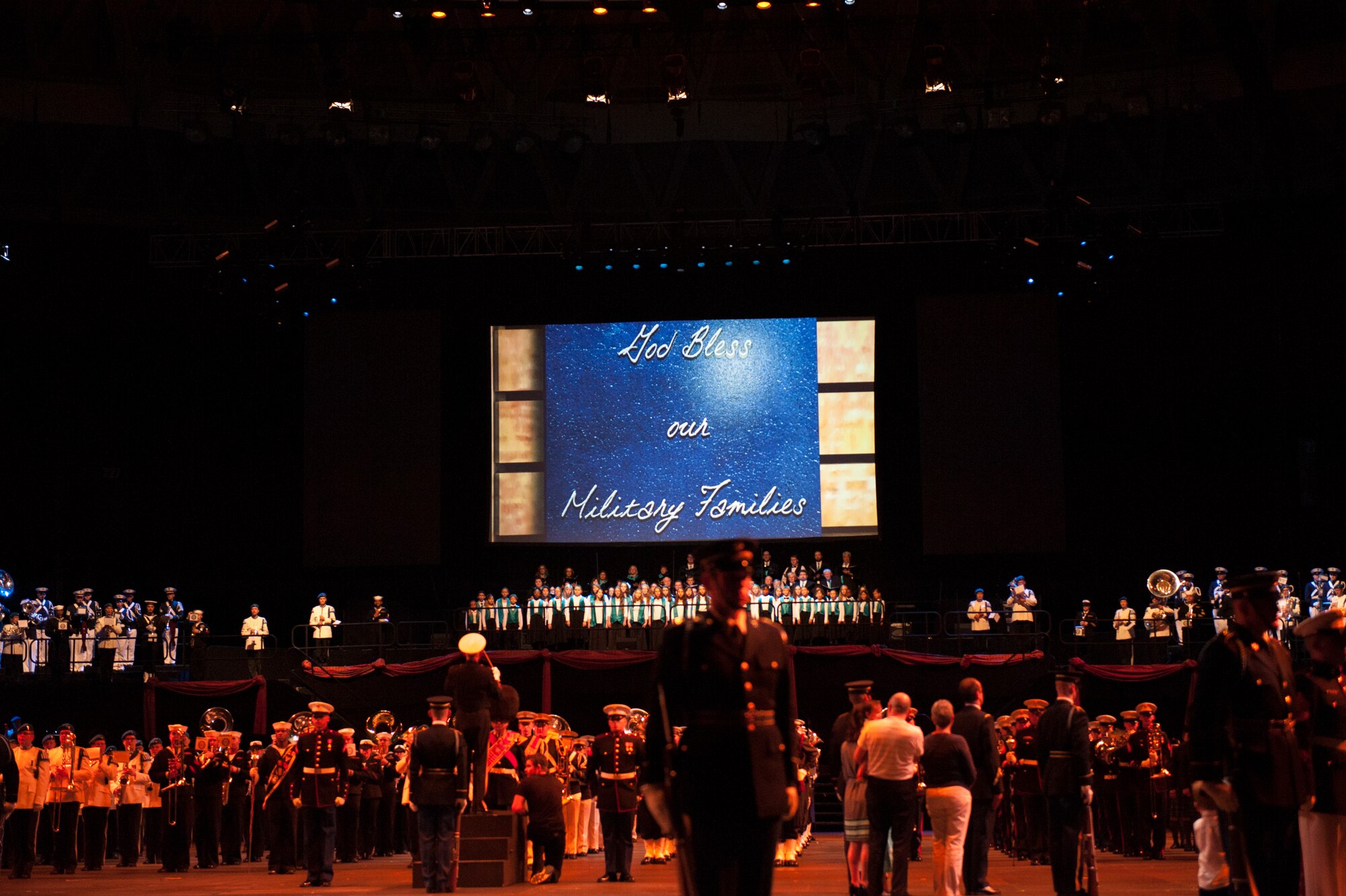 Military family members are honored at the 2015 Virginia International Tattoo, February 23. The Tattoo is an annual performance exhibiting military bands, massed pipes and drums, drill teams, Celtic dancers, cultural performers, choirs and more. This year’s theme is “A Tribute to Military Families.” (U.S. Air Force photo by Staff Sgt. Steve Stanley/Released)