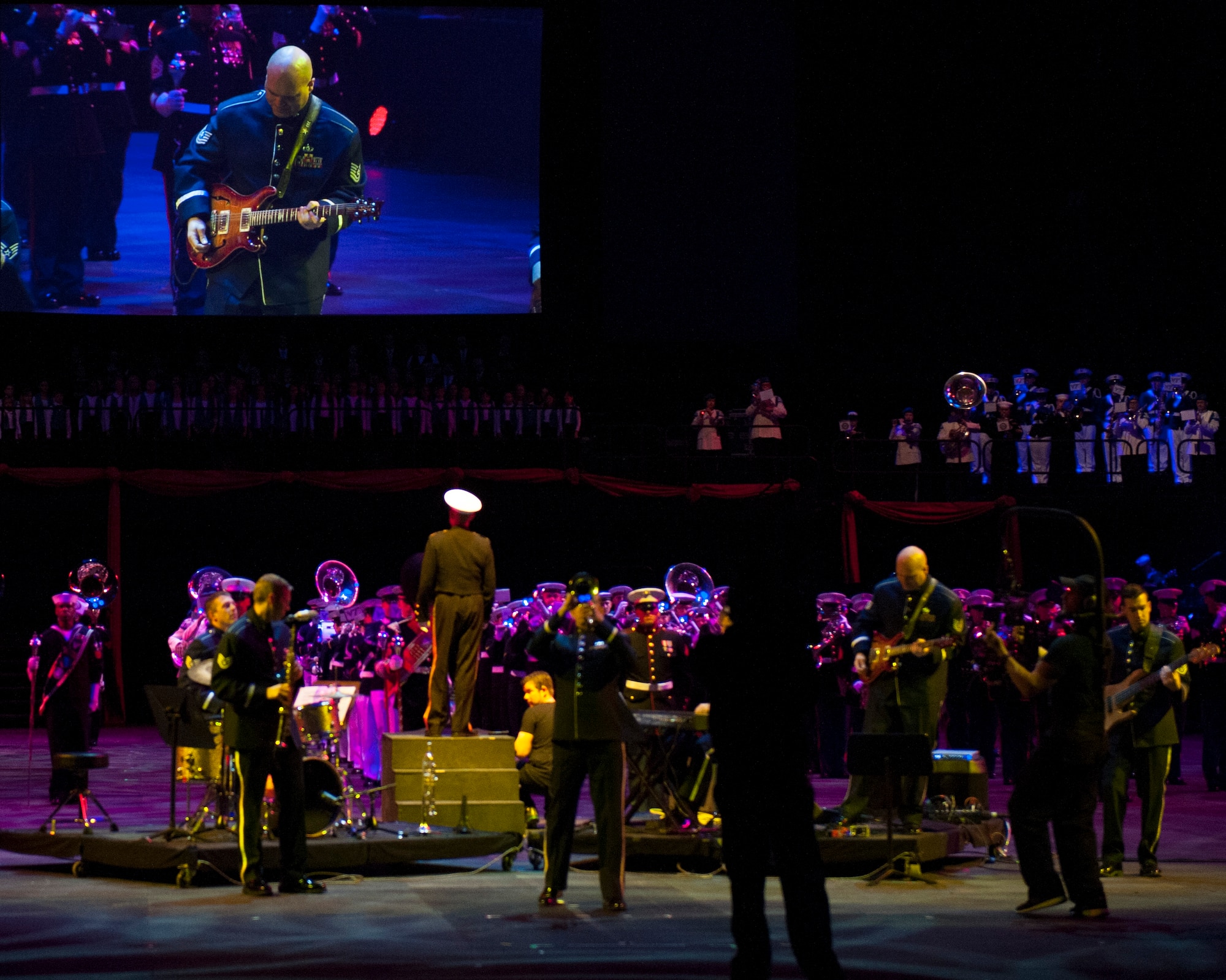 Members of the USAF Heritage of America Band perform in the 2015 Virginia International Tattoo at the Norfolk Scope Arena on February 23. The Tattoo is an annual performance exhibiting military bands, massed pipes and drums, drill teams, Celtic dancers, cultural performers, choirs and more. This year’s theme is “A Tribute to Military Families.” (U.S. Air Force photo by Staff Sgt. Steve Stanley /Released)