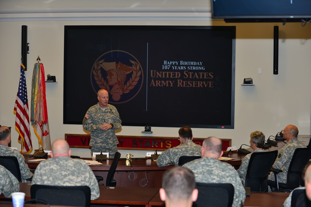 U.S. Army Lt. Gen. Kevin W. Mangum, U.S. Army Training and Doctrine Command deputy commander, speaks of the important role the Army Reserve plays in mission success during the U.S. Army Reserve’s 107th birthday celebration at TRADOC on Fort Eustis, Va., April 23, 2015.  During the celebration, the oldest and newest member of the Reserve cut the birthday cake together and two Soldiers were re-enlisted. (U.S. Air Force photo by Staff Sgt. Natasha Stannard/Released)