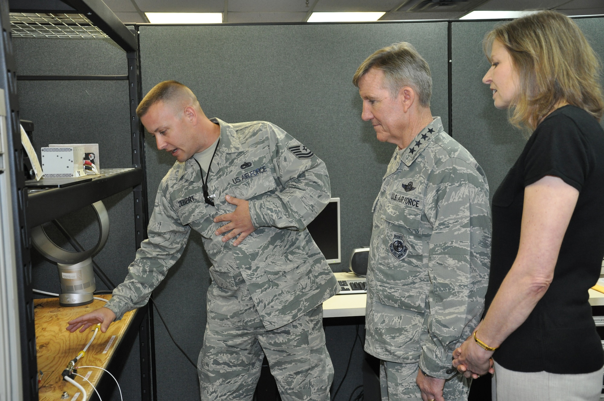 Tech. Sgt. Mitchell Zebert, a member of the 552nd Maintenance Group, discusses the Air Force repair enhancement process with Gen. Hawk Carlisle, commander of Air Combat Command, during his two-day visit to Tinker Air Force Base, April 21-22. During his first visit to the base since assuming command of ACC in November, the general and Mrs. Gillian Carlisle met with Airmen of the 552nd Air Control Wing and the Oklahoma City Air Logistics Complex’s Maintenance, Repair and Overhaul Technology Center. Additional coverage of Gen. Carlisle’s visit will appear in next week’s Tinker Take Off. (Air Force photo by Darren D. Heusel/Released)