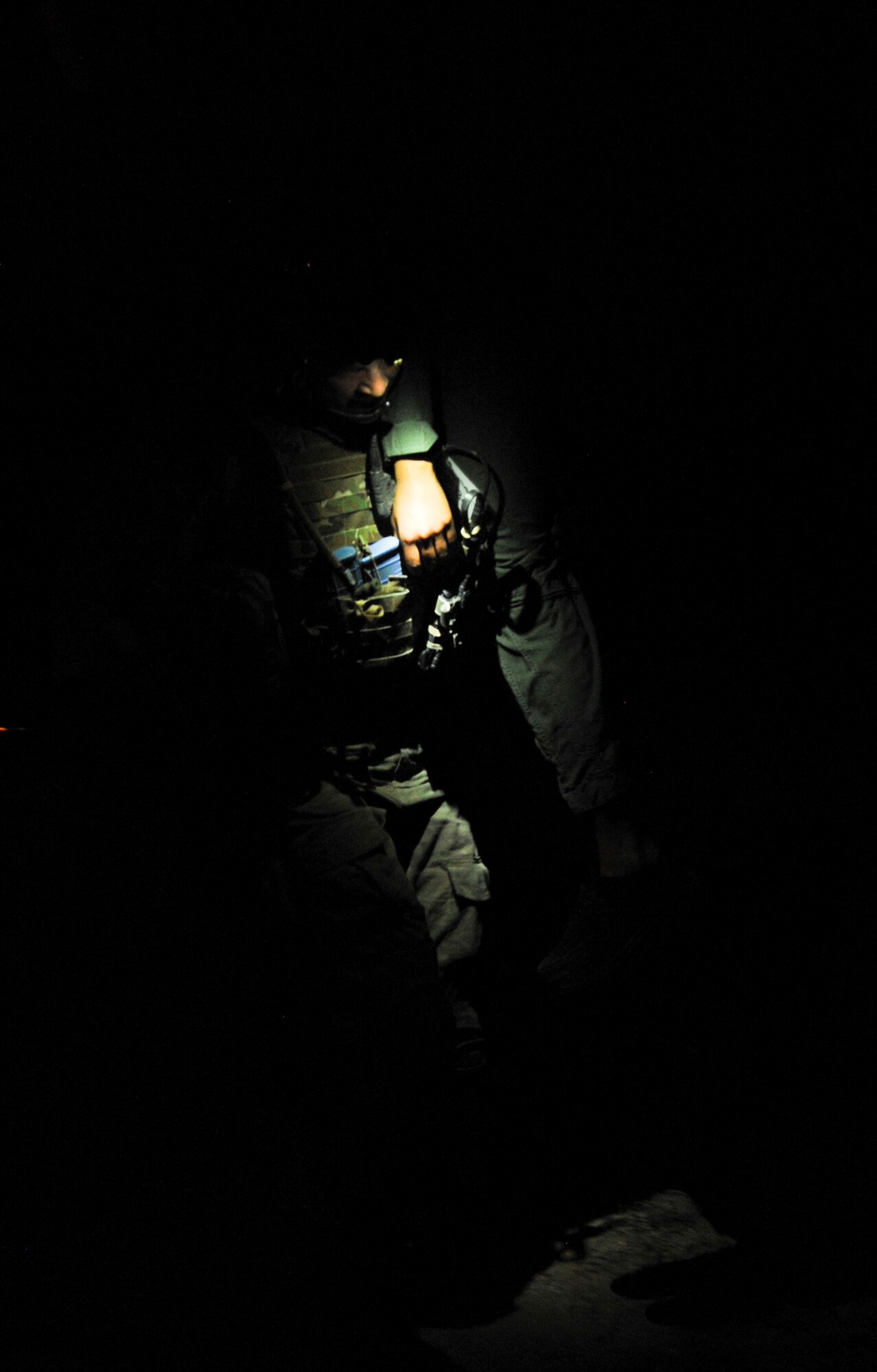 A U.S. Air Force Staff Sergeant, 48th Rescue Squadron, carries a simulated patient during a pre-deployment training exercise at Davis-Monthan Air Force Base, Ariz., April 14, 2015.  Several Airmen from D-M participated as simulated victims to create a realistic training environment. Due to security concerns, the Airman’s name is withheld. (U.S. Air Force photo by Senior Airman Betty R. Chevalier)