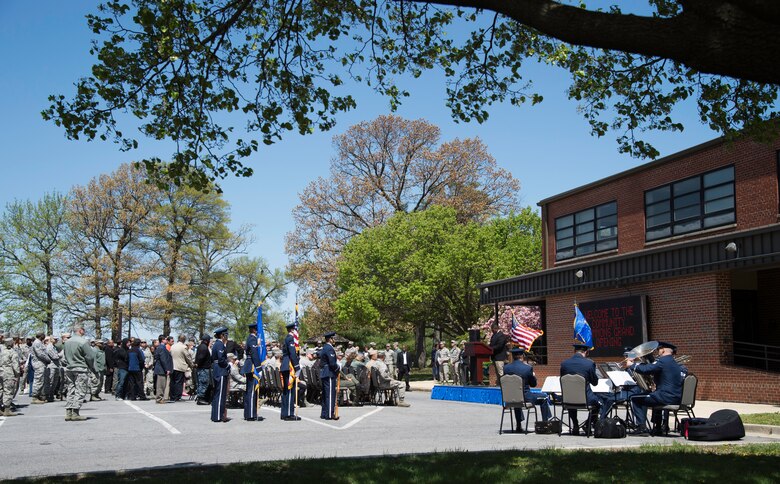A crowd gathers for the grand opening of the Community Commons at Joint Base Andrews, Md., April 24, 2015. The Community Commons aims to foster a deeper sense of community on JBA. (U.S. Air Force photo/Airman 1st Class Philip Bryant)