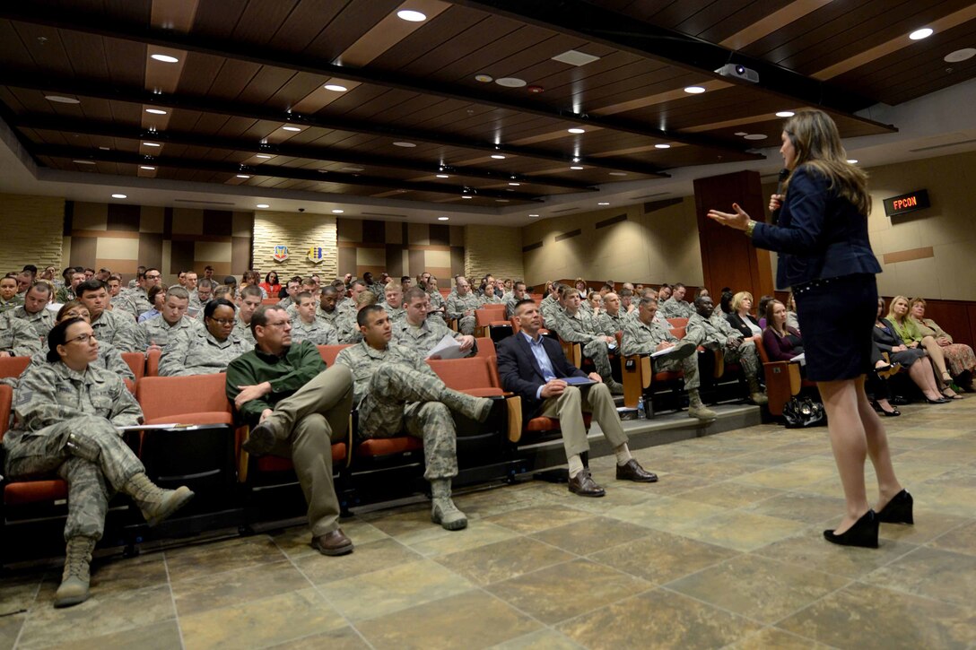 Ellie Kay, author of Heroes at Home, speaks to Airmen at the Deployment Center during a financial education seminar at Ellsworth Air Force Base, S.D., April 16, 2015. Nearly 150 Ellsworth Airmen and civilians attended the 1.5 hour seminar, learning how credit works, tips on saving money, how to budget and prepare themselves for a financially stable future. (U.S. Air Force photo by Airman 1st Class Rebecca Imwalle/ Released)