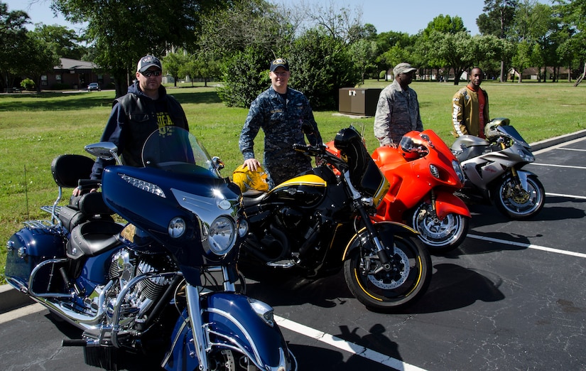 Winners of the 2015 Annual Motorcycle Safety Day Bike Judging Competition pose for a photo, April 24, 2015 at Joint Base Charleston – Air Base, S.C. Motorcycles were judged in four categories: Custom Bikes, Cruisers, Sport Bikes and Commander’s Choice. Winners (from left to right) were Chris Robin (Cruiser), 437th Maintenance Squadron; U.S. Navy LT Peter McLaughlin (Commander’s Choice), 628th Mission Support Group/Naval Support Activity; Master Sgt. James Ferguson (Custom Bike), 437th Operations Support Squadron; and Marcus Perkins (Sport Bike), 315th Airlift Wing. (U.S. Air Force photo/Staff Sgt. AJ Hyatt) 
