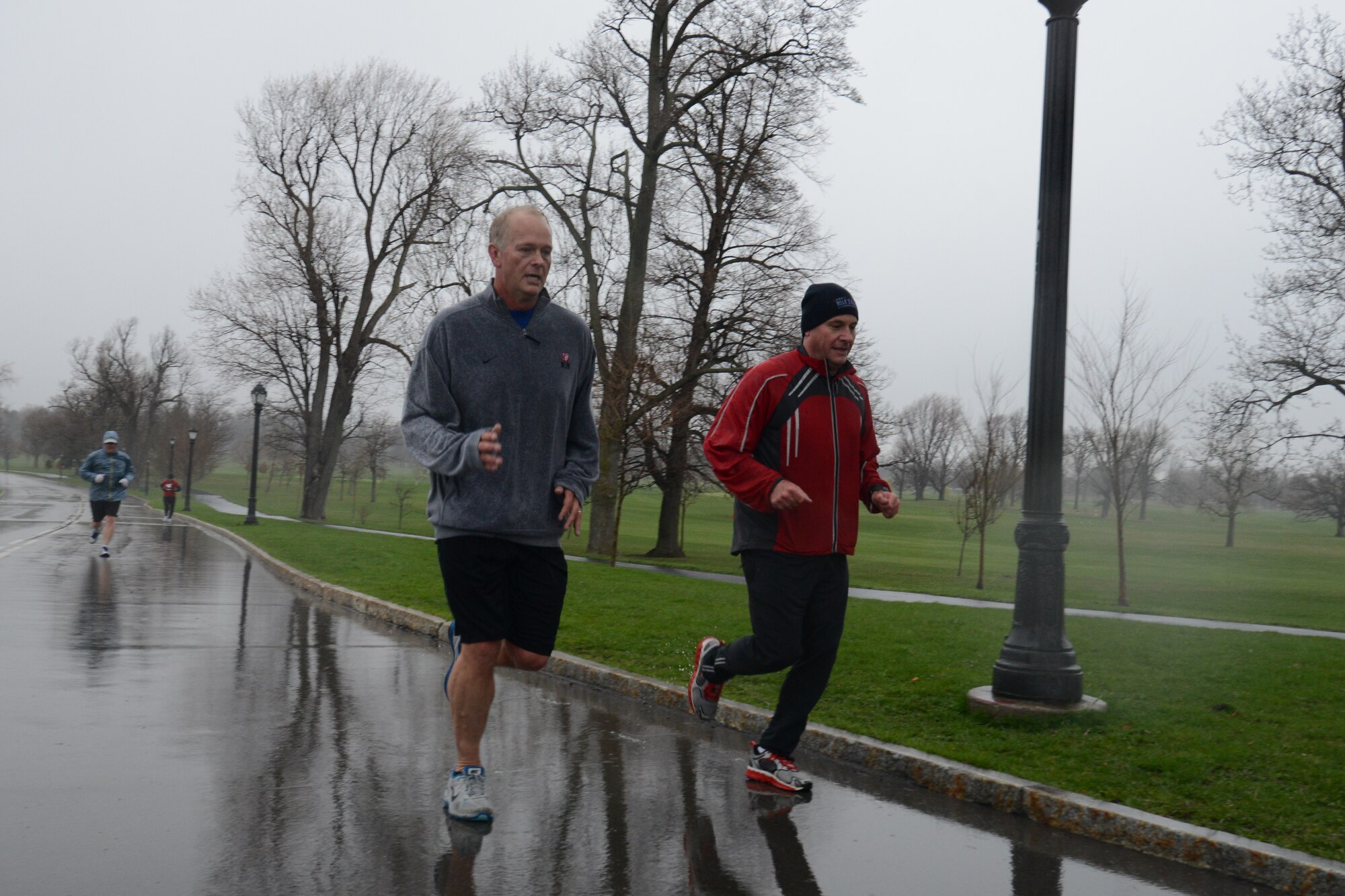 914th Airlift Wing Commander Col. Steven Parker (left) and Command Chief Master Sgt. Clint Ronan, near the finish line during a run celebrating the U.S. Air Force Reserve Birthday Delaware Park in Buffalo, NY April 22, 2015. Airmen of the 914th Airlift Wing and the local chapter of Team Red White and Blue, a Veteran Outreach organization, ran a cumulative 67 laps at Delaware Park in Buffalo, NY in honor of the 67th birthday of the U.S. Air Force Reserve. (U.S. Air Force photo by Tech. Sgt. Andrew Caya)