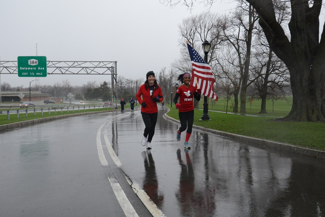 Members of the 914th Airlift Wing the local chapter of Team Red White and Blue finish running at Delaware Park in Buffalo, NY April 22, 2015. Team RWB a Veteran Outreach organization, and Airmen of the 914th Airlift Wing ran a cumulative 67 laps at Delaware Park in Buffalo, NY in honor of the 67th birthday of the U.S. Air Force Reserve. (U.S. Air Force photo by Tech. Sgt. Andrew Caya)