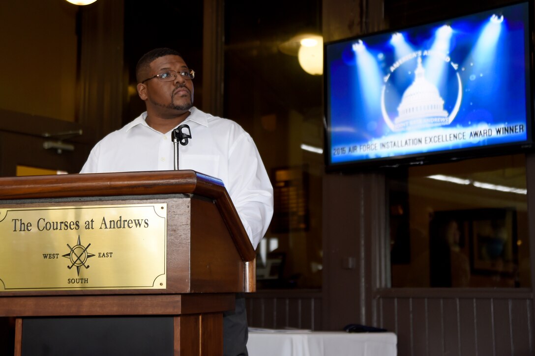 Stacey Bradshaw, 11th Force Support Squadron personnel systems manager, prepares to speak during am event celebrating Joint Base Andrews recognition as the U.S. Air Force top installation at The Courses at Andrews here, April 22, 2015. JBA will compete for the Department of Defense’s 2015 Commander in Chief's Installation Excellence Award. (U.S. Air Force photo/Airman 1st Class Ryan J. Sonnier)