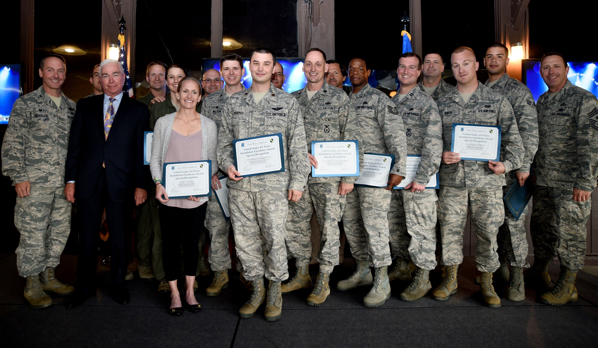 The 2015 special recognition nominees receive certificates during a ceremony at The Courses at Andrews, Joint Base Andrews, Md., April 22, 2015. The special recognition category is a secretary of defense award, recognizing units, teams and individuals for exemplary achievement in support of installation excellence. (U.S. Air Force photo/Airman 1st Class Ryan J. Sonnier)