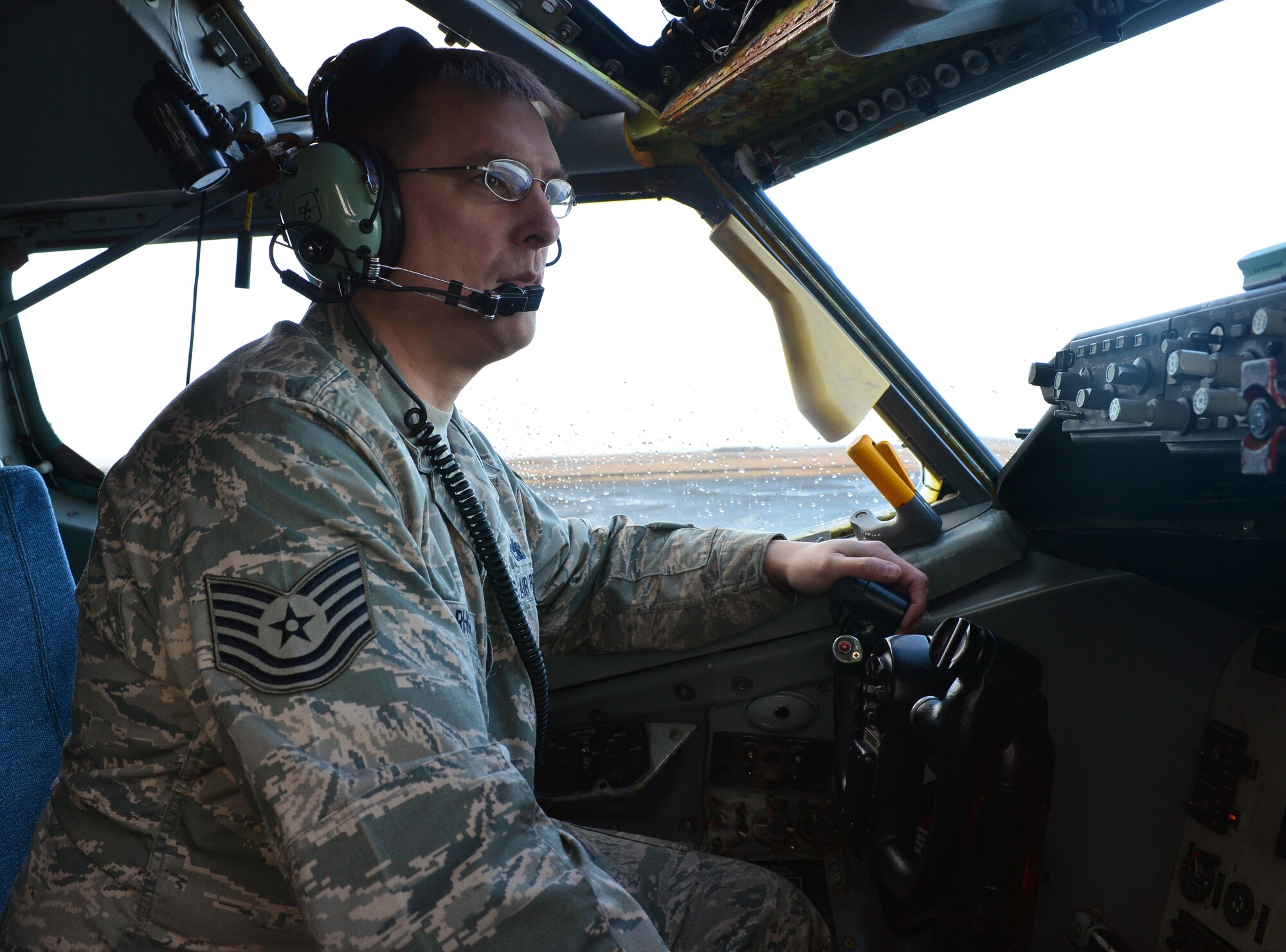U.S. Air Force Tech. Sgt. Raymond Rhodes, an 871st Air Expeditionary Squadron KC-135 Stratotanker crew chief, performs pre-flight maintenance operations during Icelandic Air Surveillance and Policing at Keflavik International Airport, Iceland, April 21, 2015. The KC-135 provides air refueling capability to U.S. Air Force fighter assets, increasing their range and increasing mission capability. IAS is a recurring NATO mission designed to maintain the security of Icelandic airspace by providing a fighter aircraft presence in the region.
(U.S. Air Force photo by 2nd Lt Meredith Mulvihill/Released)