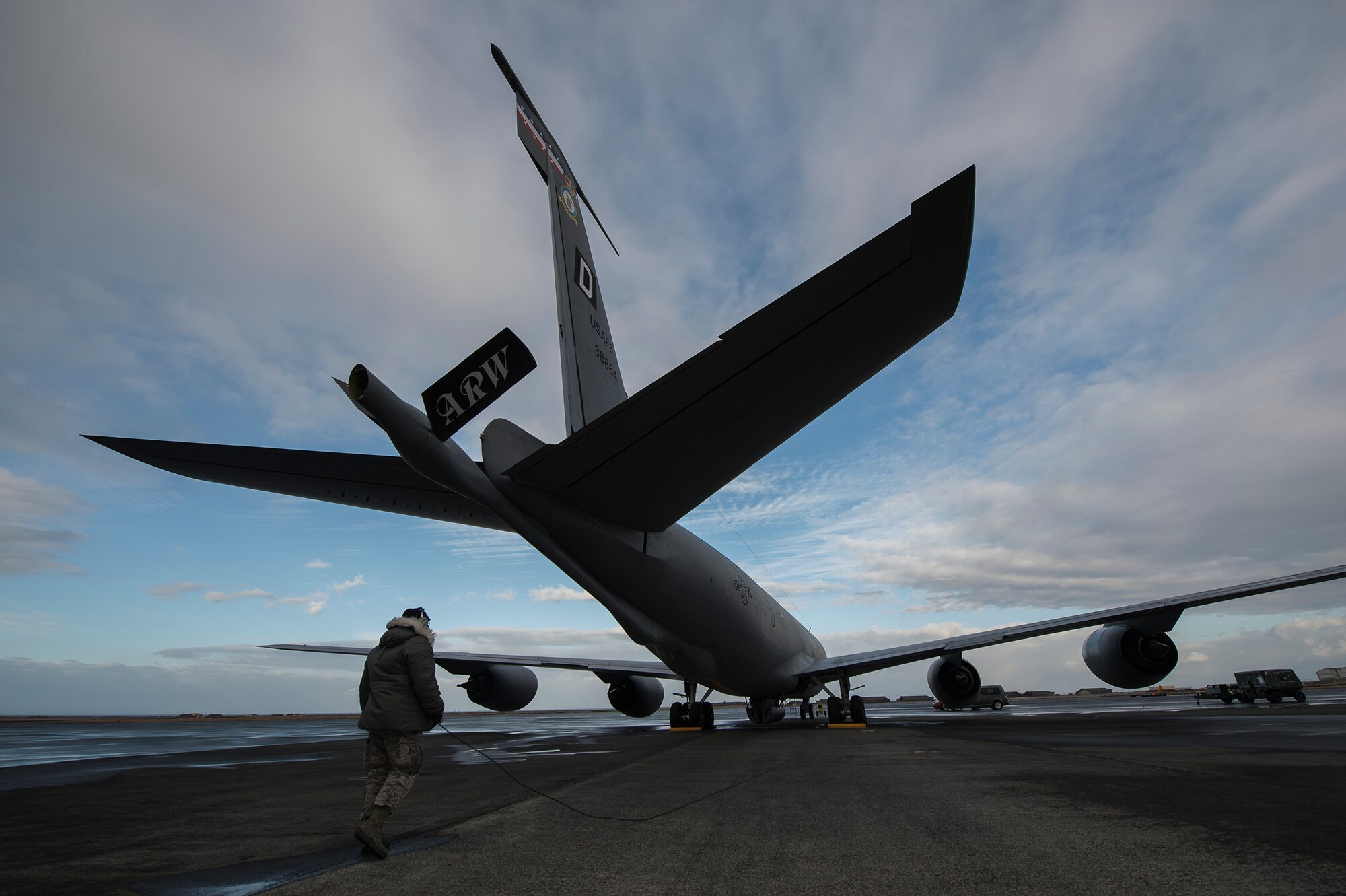 U.S. Air Force Senior Airman Tyler Miller, an 871st Air Expeditionary Squadron aero repair technician, performs a pre-flight inspection on a KC-135 Stratotanker aircraft during the Icelandic Air Surveillance and Policing mission at the Keflavik International Airport April 21, 2015. The KC-135 provides air refueling capability to the fighter assets, increasing their range and expanding their mission capability. The IAS mission is a recurring NATO commitment designed to maintain the security of Icelandic airspace by providing a fighter aircraft presence in the region. (U.S. Air Force photo by Staff Sgt. Chad Warren/Released)