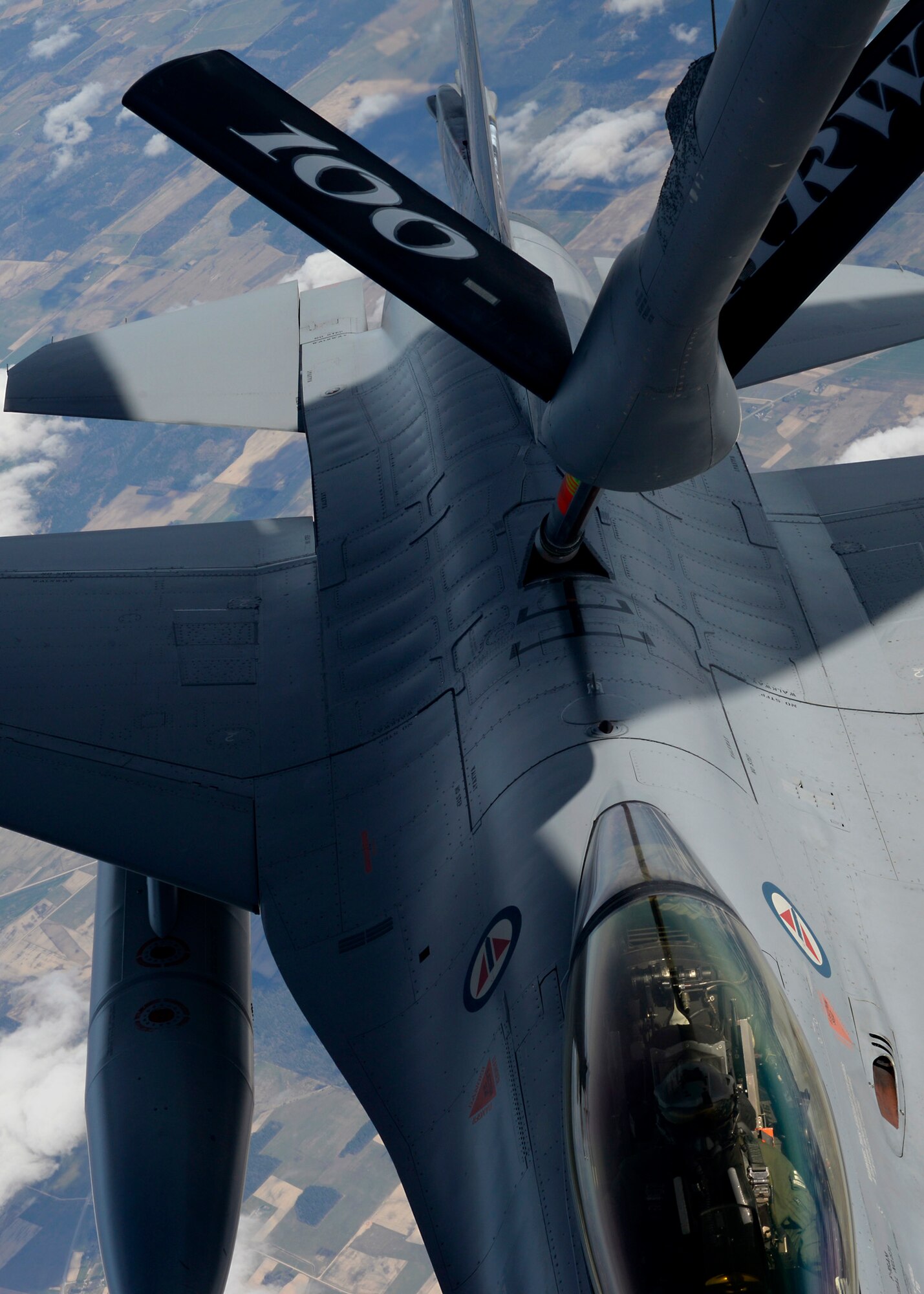 An F-16 Fighting Falcon assigned to the Royal Norwegian Air Force receives fuel from a KC-135 Stratotanker assigned to RAF Mildenhall, England, while participating in a training event April 22, 2015, over the Baltic region. The Baltic Region Training Event is focused on enhancing air interoperability and cooperation among NATO and regional partner air forces. (U.S. Air Force photo by Senior Airman Victoria H. Taylor/Released)