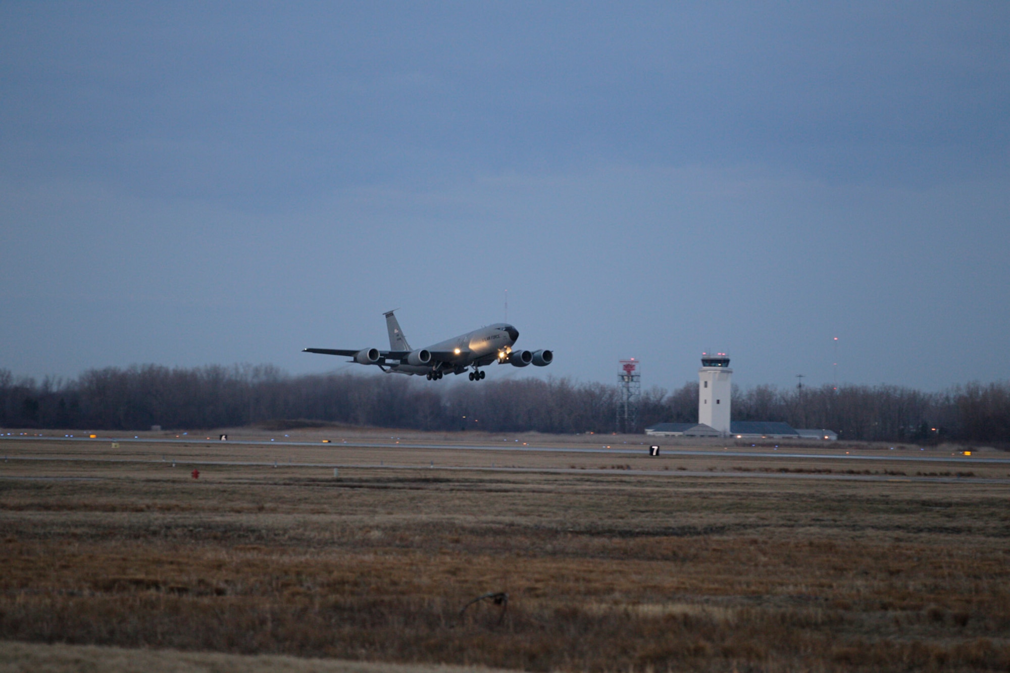 150411-Z-NJ721-203 – A KC-135 Stratotanker from the 171st Air Refueling Squadron takes off from Selfridge Air National Guard Base at dawn on April 11, 2015. The KC-135s, an aerial refueling aircraft, were supporting a deployment of several other units from the base to Southwest Asia. (U.S. Air National Guard photo by Tech. Sgt. Robert Hanet)