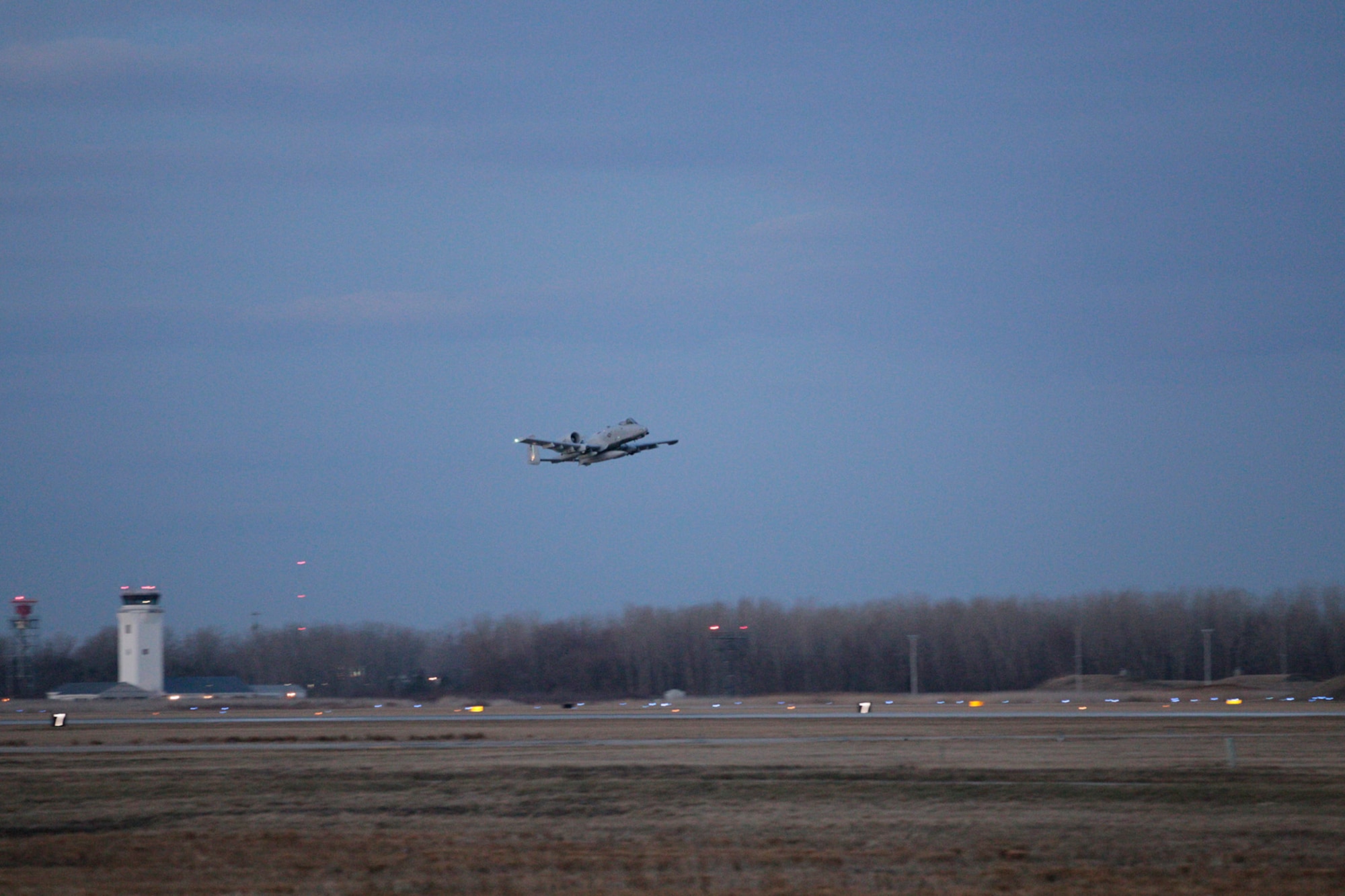 150411-Z-NJ721-085 – An A-10 Thunderbolt II from the 107th Fighter Squadron takes off from Selfridge Air National Guard Base at dawn on April 11, 2015. The A-10s and related Airmen deployed to Southwest Asia.  (U.S. Air National Guard photo by Tech. Sgt. Robert Hanet)
