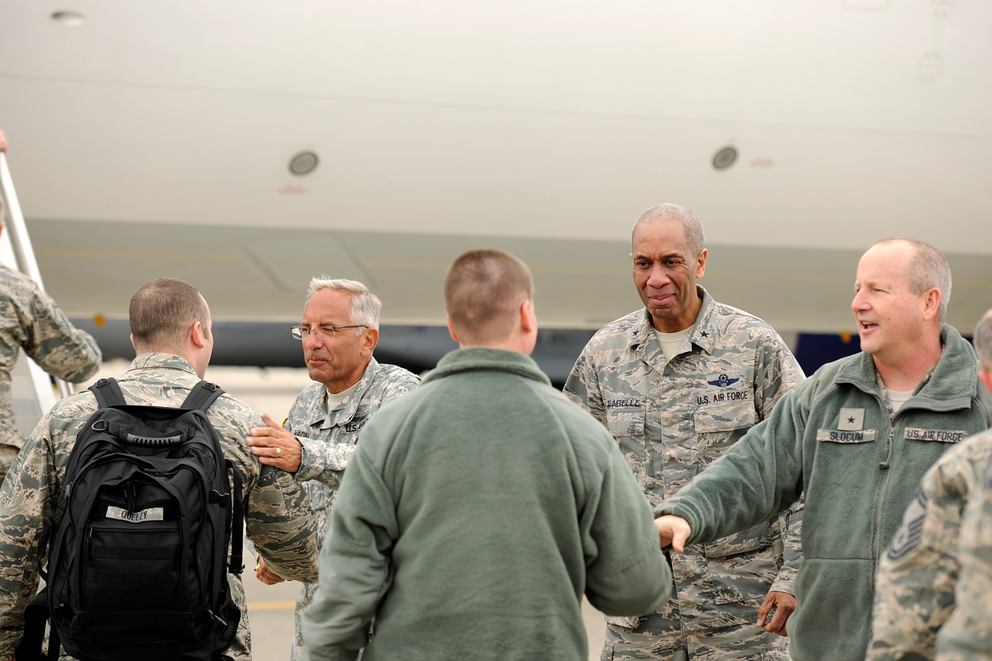 150410-Z-EZ686-007 -- Senior leaders of the Michigan National Guard shake hands with deploying members of the 127th Wing at Selfridge Air National Guard Base, Mich., April 10, 2015. Sending off the Airmen are Major Gen. Gregory J. Vadnais, adjutant general of Michigan; Brig. Gen. Leonard W. Isabelle Jr., commander of the Michigan Air National Guard; and Brig. Gen. John D. Slocum, commander of the 127th Wing. (U.S. Air National Guard photo by Master Sgt. David Kujawa)