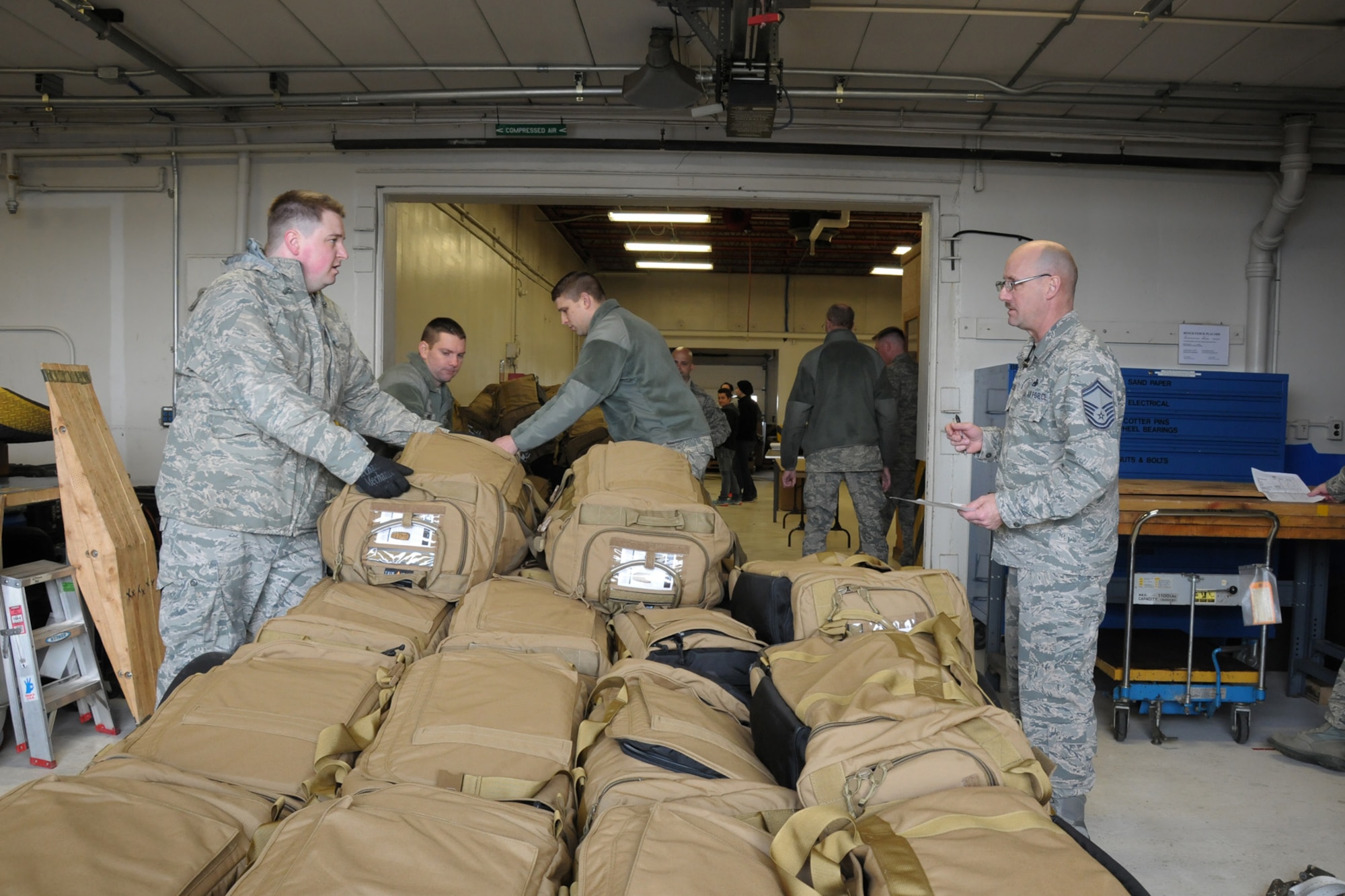 150308-Z-YW189-015 --  Mobility bags are prepared for Airmen of the 127th Wing who recently deployed to Southwest Asia. The deployment involved a total team effort around the wing. (U.S. Air National Guard photo by Staff Sgt. Samara Taylor)