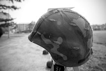 A helmet on display represents a reported sexual assault as part of a silent walk during Kunsan’s observance of Sexual Assault Awareness and Prevention Month April 24, 2015, at Kunsan Air Base, Republic of Korea. The event also included performances by Kunsan’s Sexual Assault Theater Group that educate Airmen on sexual assault prevention using scenario-based presentations. (U.S. Air Force photo by Senior Airman Katrina Heikkinen/Released)