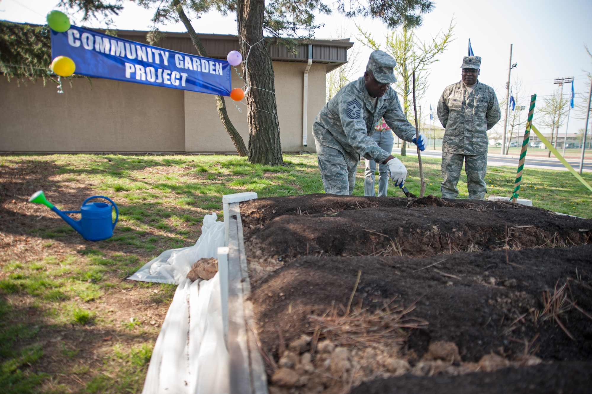 Chief Master Sgt. Lee “Wolf Chief” Barr, 8th Fighter Wing command chief, plants a fig tree in the Wolf Pack Garden in observance of Earth at Kunsan Air Base, Republic of Korea, April 22, 2015. The garden project started March 14 as part of a community initiative to promote healthy living for Wolf Pack Airmen. (U.S. Air Force photo by Tech. Sgt. George Maddon/Released
