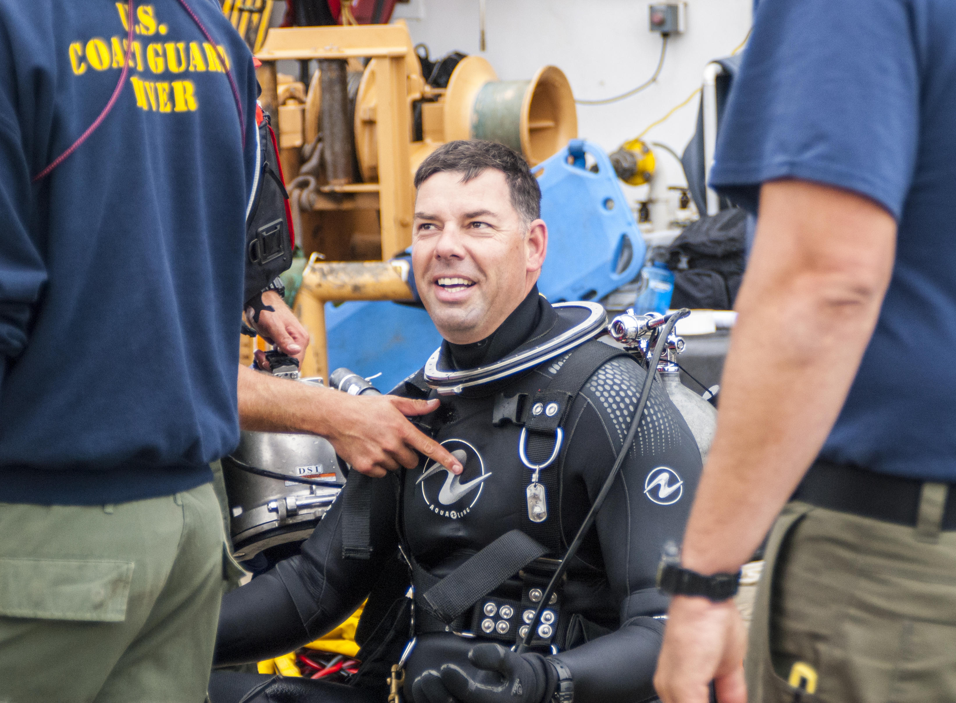 Coast Guard Diver Chief Petty Officer Charles Ashmore Recovers Aboard The Coast Guard Cutter George Cobb