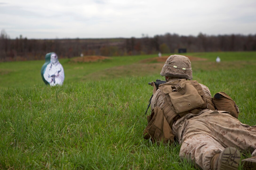 A Marine aims at a target during an infantry platoon battle course on Fort Pickett, Va., April 15, 2015.