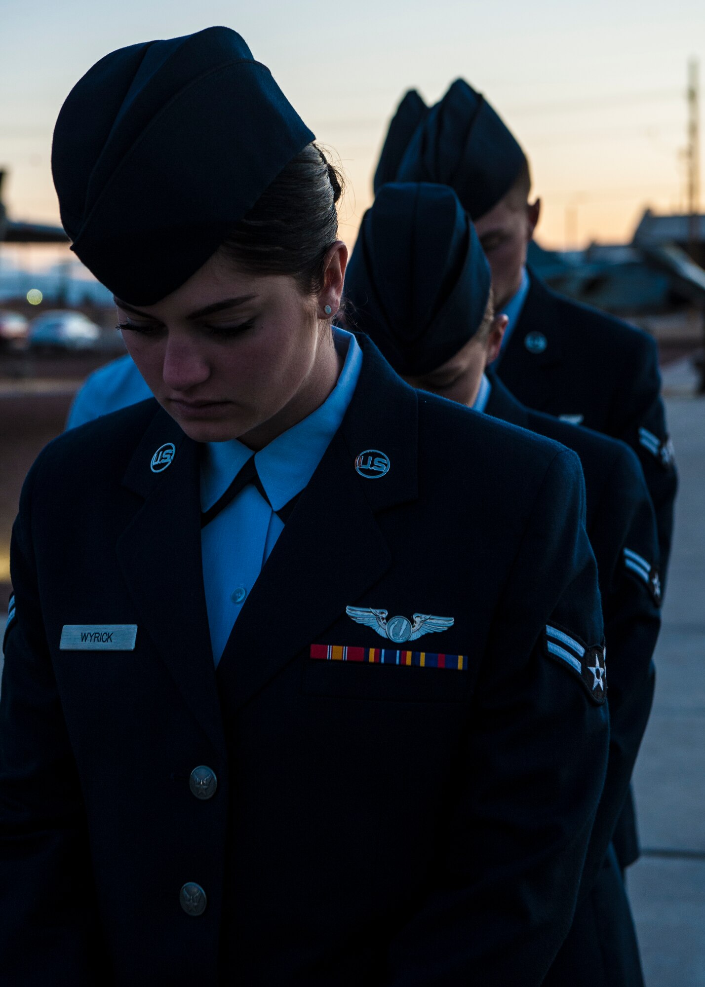 U.S. Airmen bow their heads during a prayer at the Anzac commemorative service April 25, 2015 at Holloman Air Force Base, N.M. Anzac originally meant any Australian or New Zealander who had fought in the battle of Gallipoli, and later came to mean any Australian or New Zealander who fought in the First World War. At dawn, Australians recognize the courage, mateship and sacrifices made during the battle of Gallipoli and honor the 8,000 men who made the ultimate sacrifice. (U.S. Air Force photo by Airman 1st Class Emily A. Kenney/Released) 
